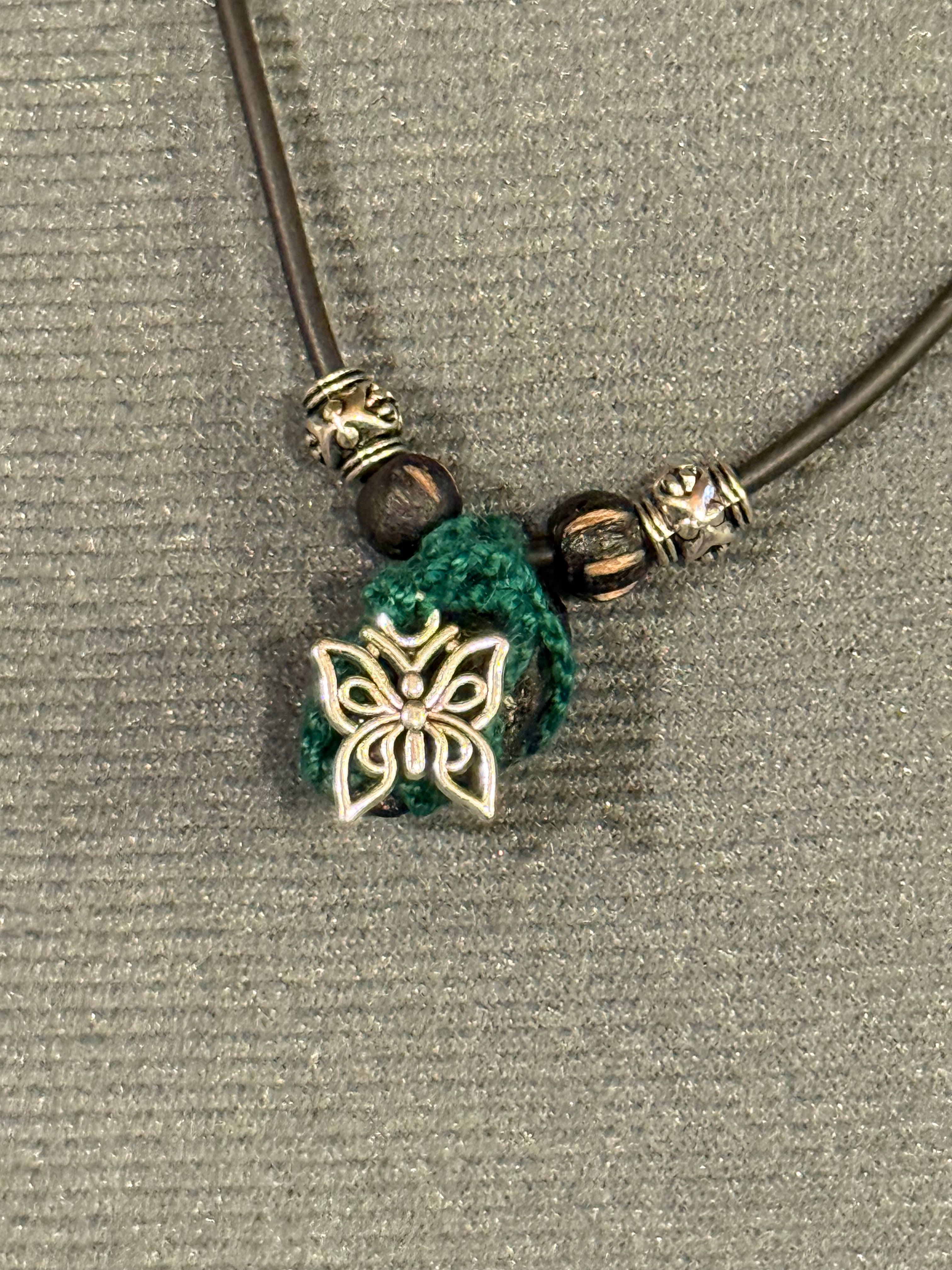 Black tourmaline and butterfly necklace