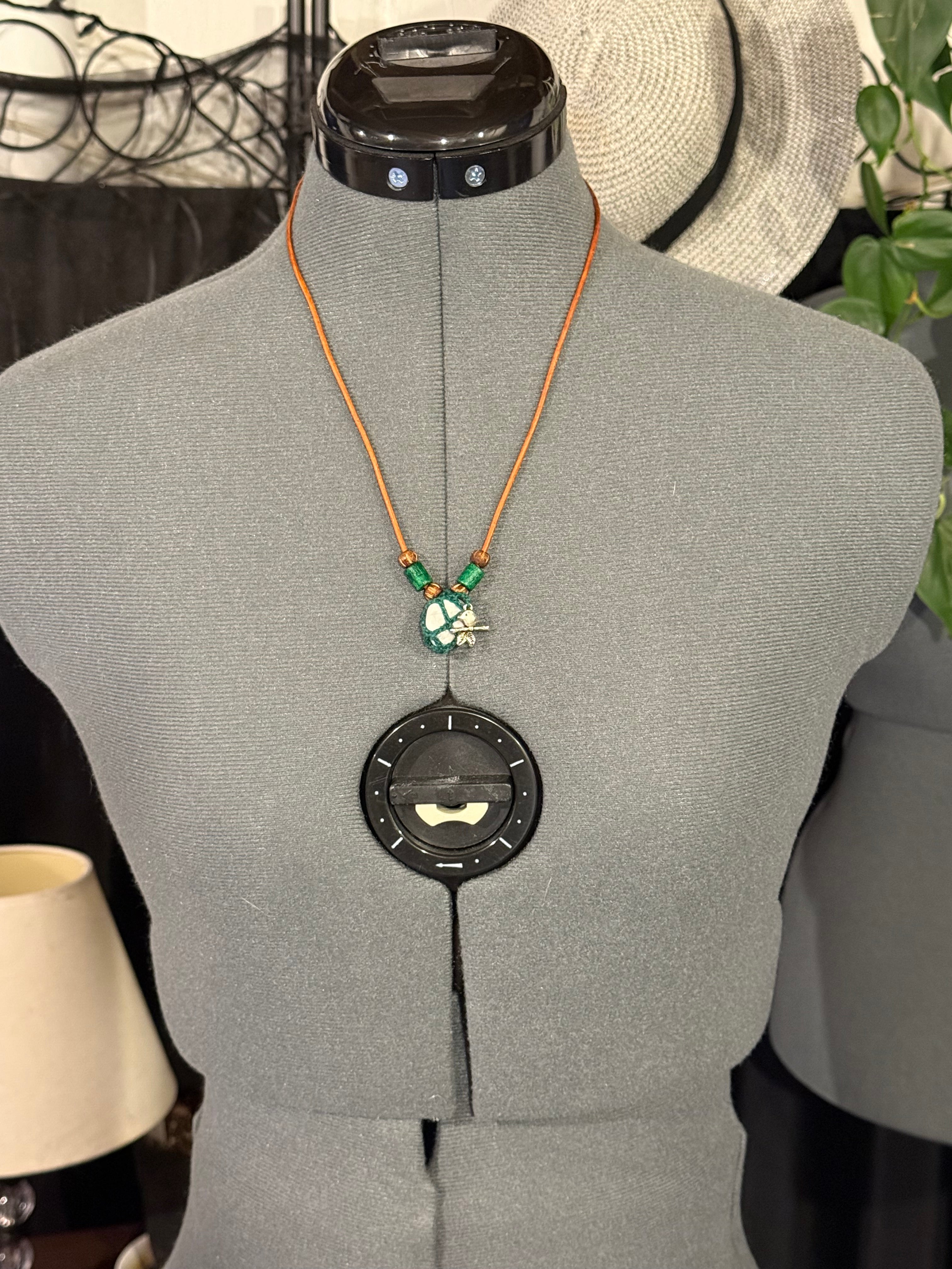 Howlite necklace with bird charm