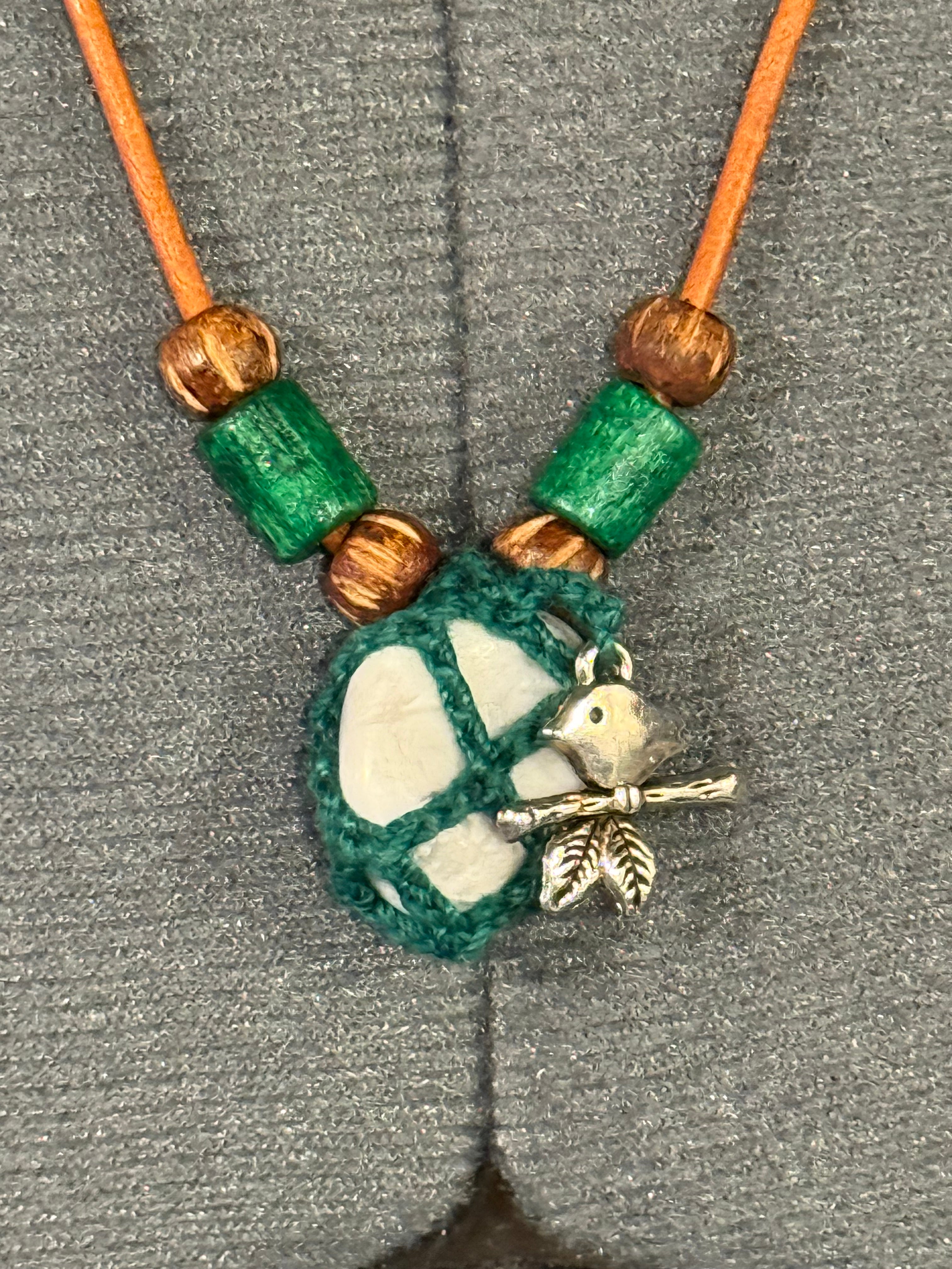 Howlite necklace with bird charm