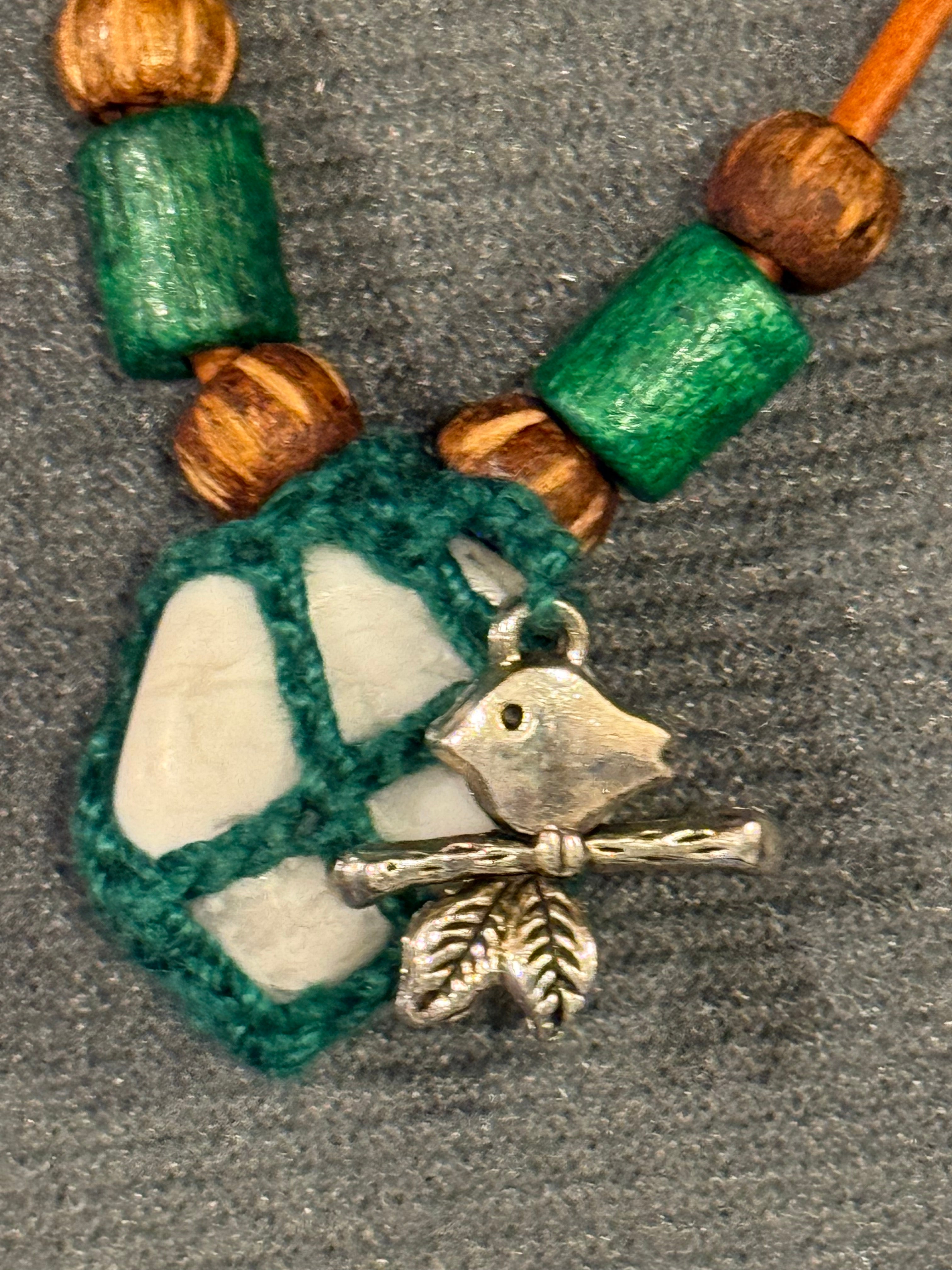 Howlite necklace with bird charm