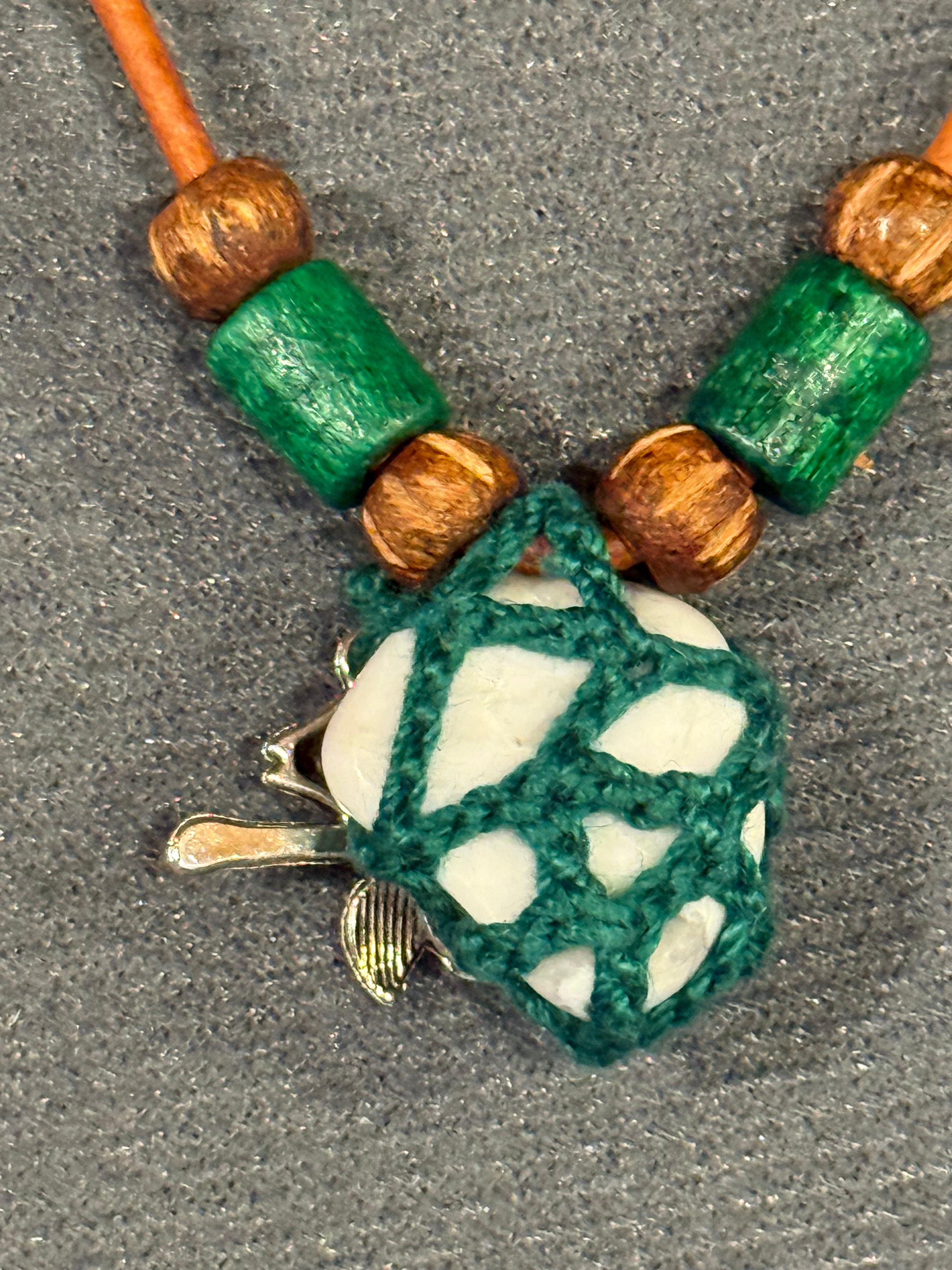 Howlite necklace with bird charm