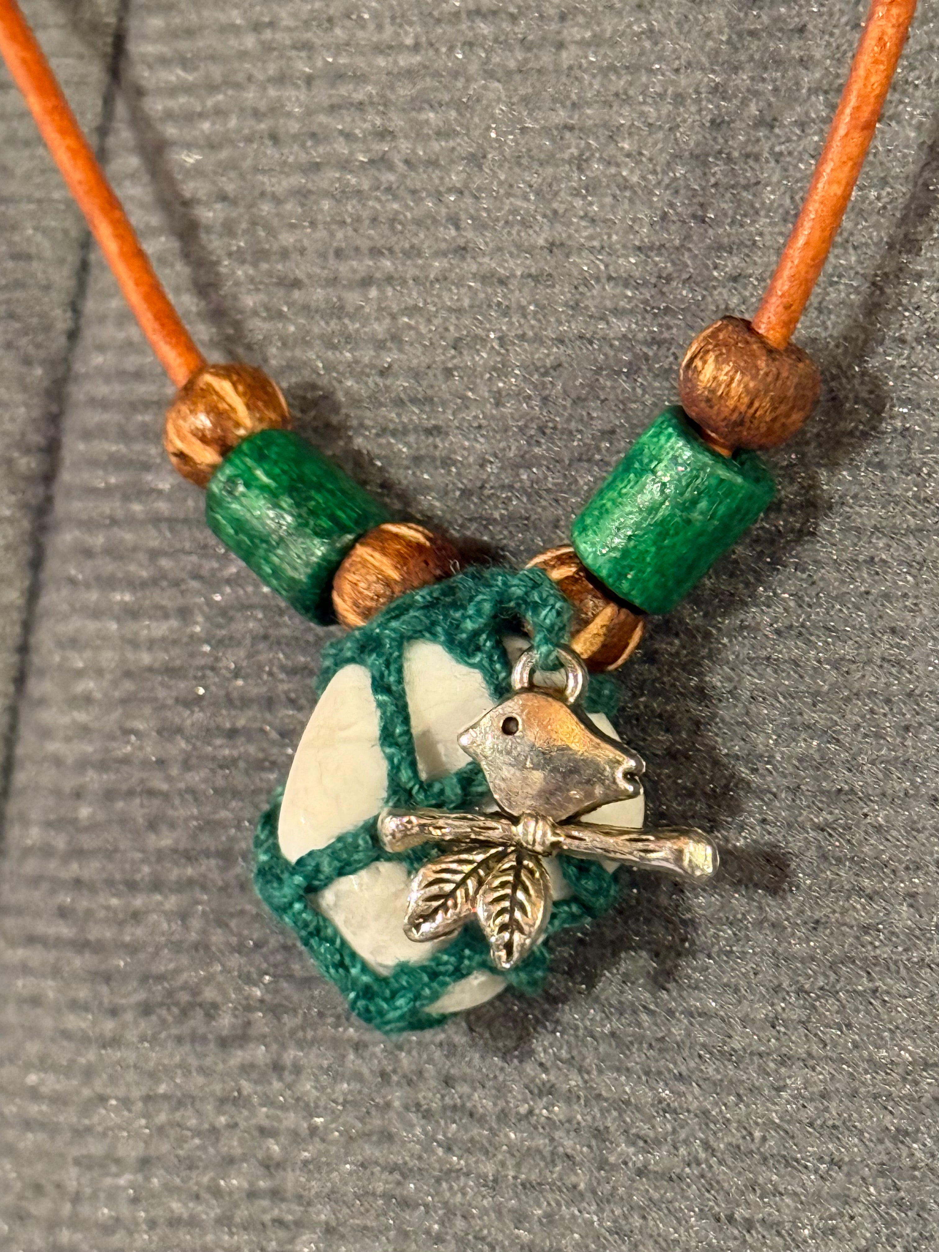 Howlite necklace with bird charm