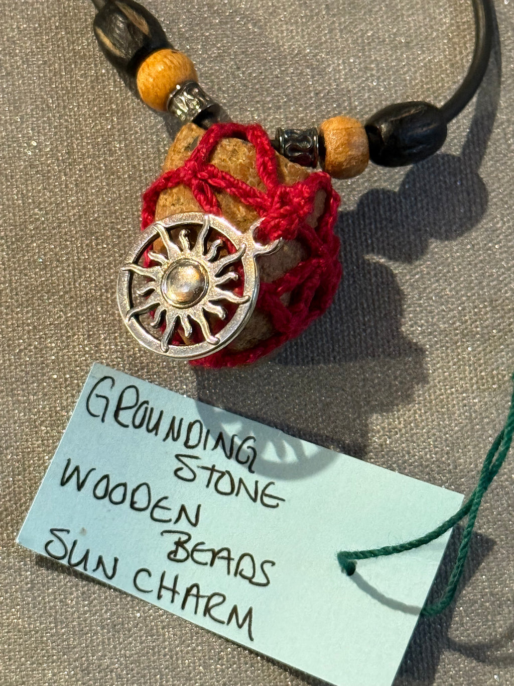 sun charm grounding stone necklace