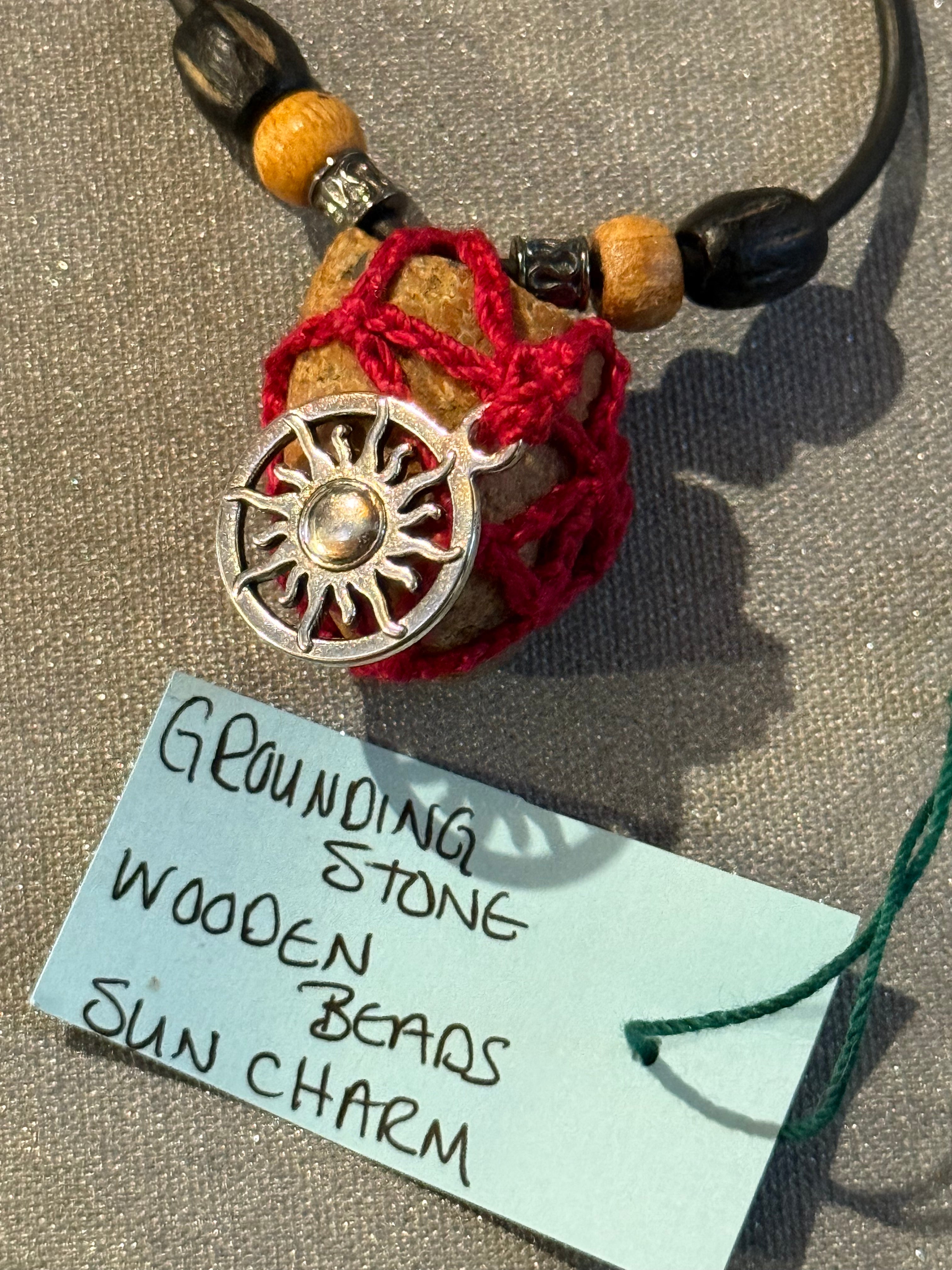 sun charm grounding stone necklace