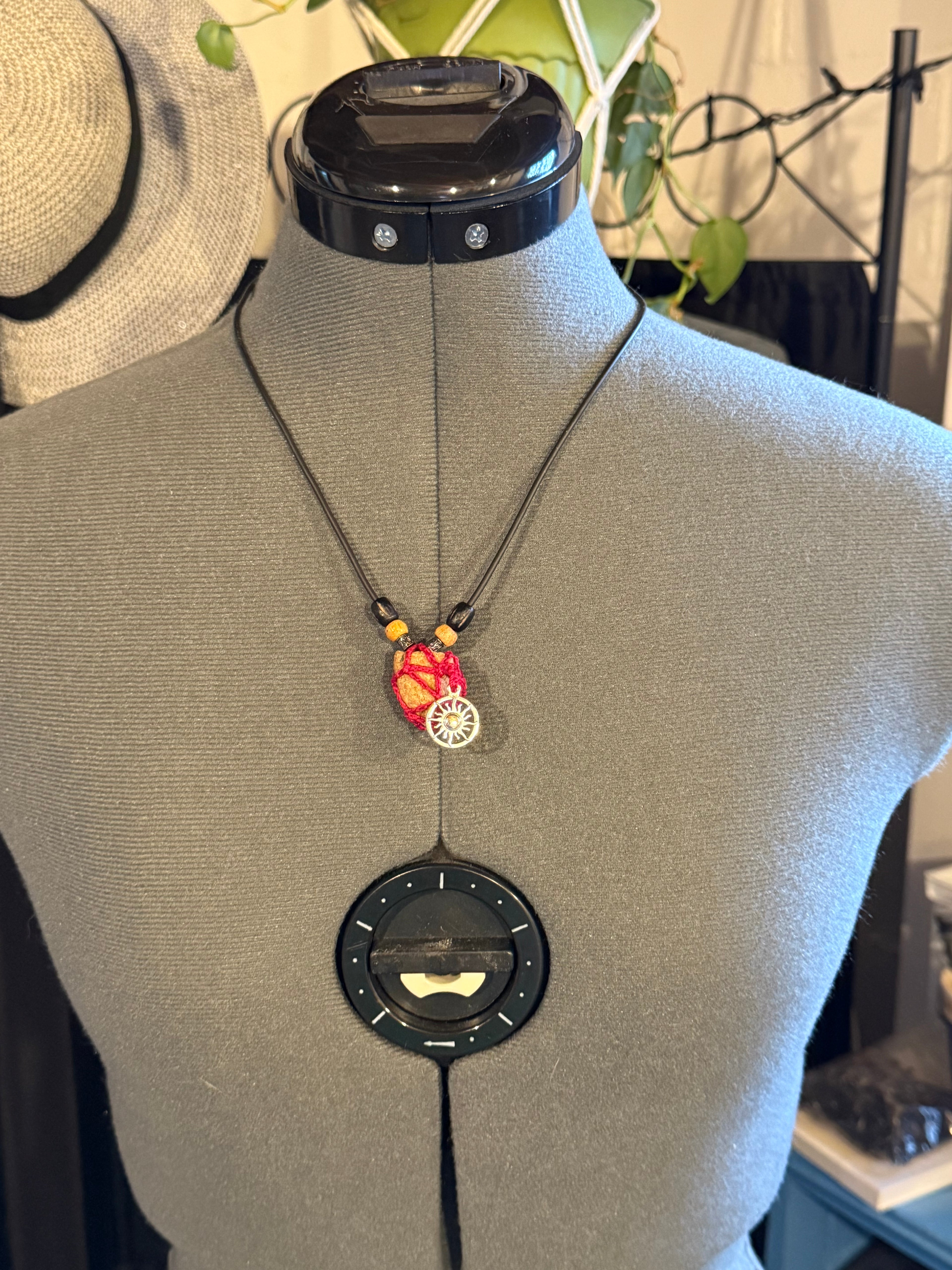 sun charm grounding stone necklace