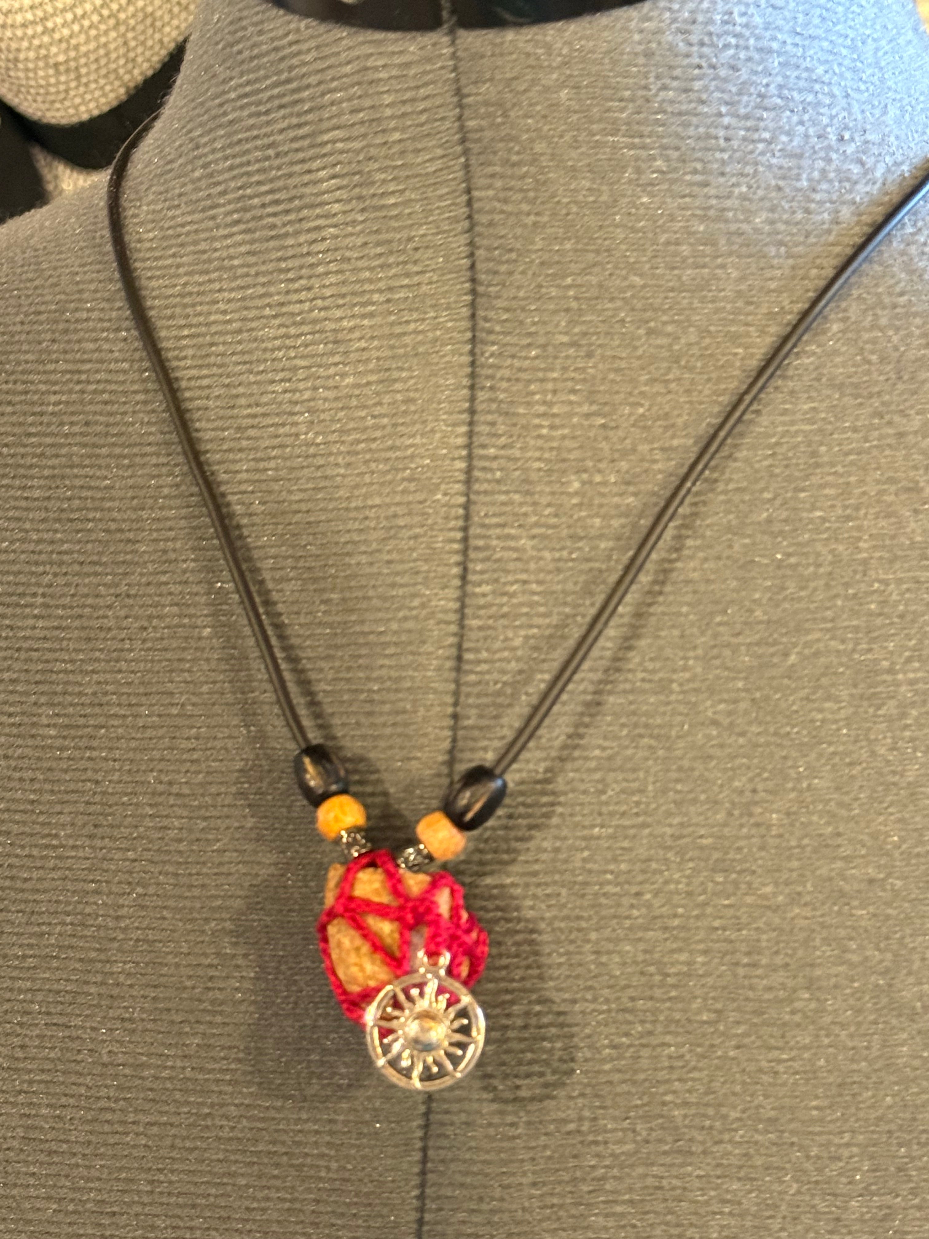 sun charm grounding stone necklace