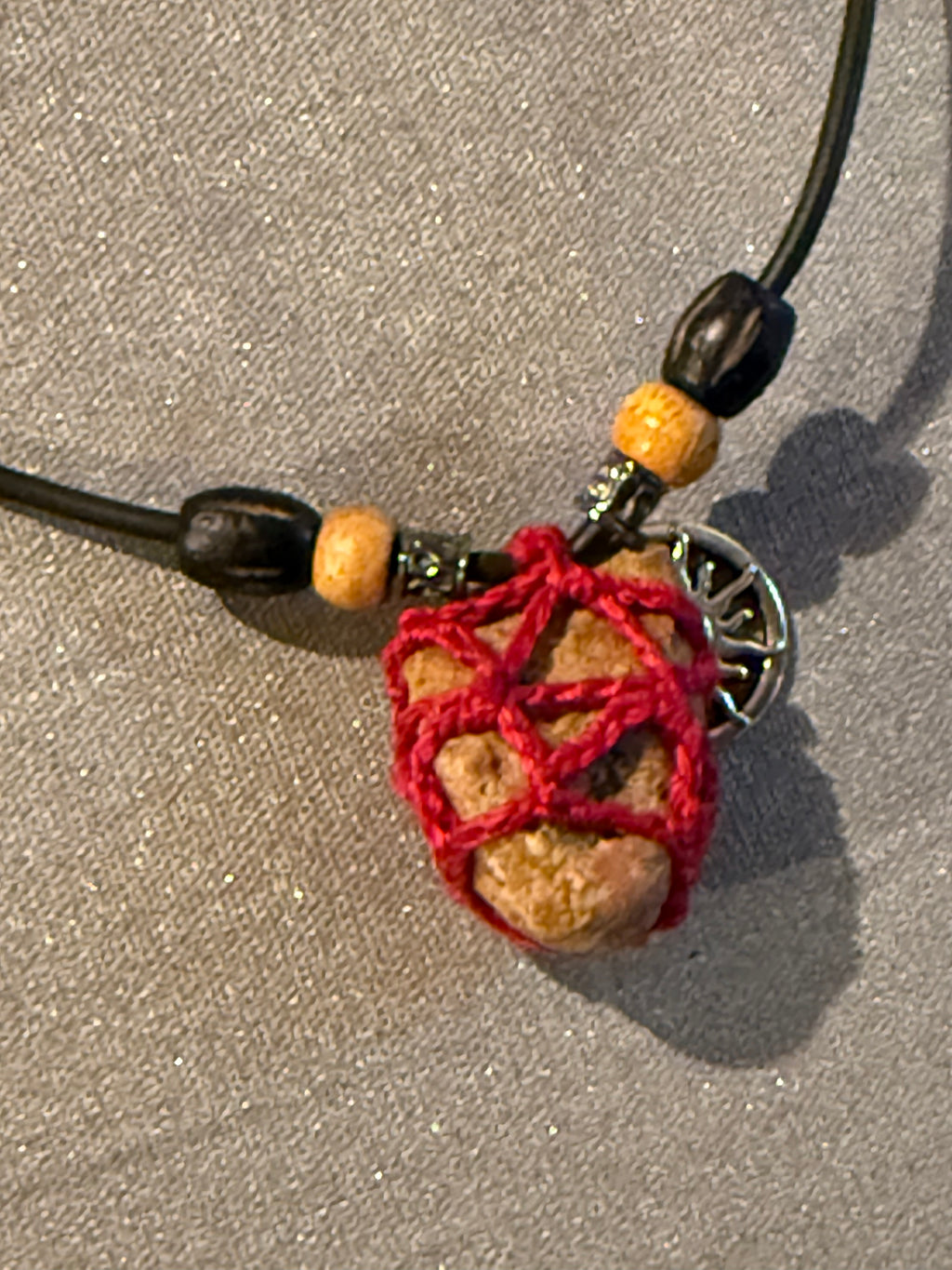 sun charm grounding stone necklace
