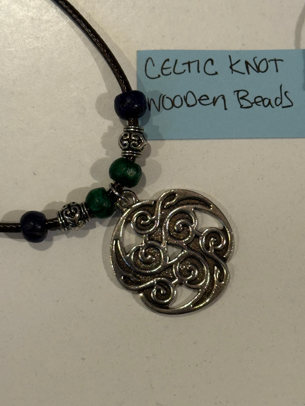 celtic knot necklace with blue and green beads