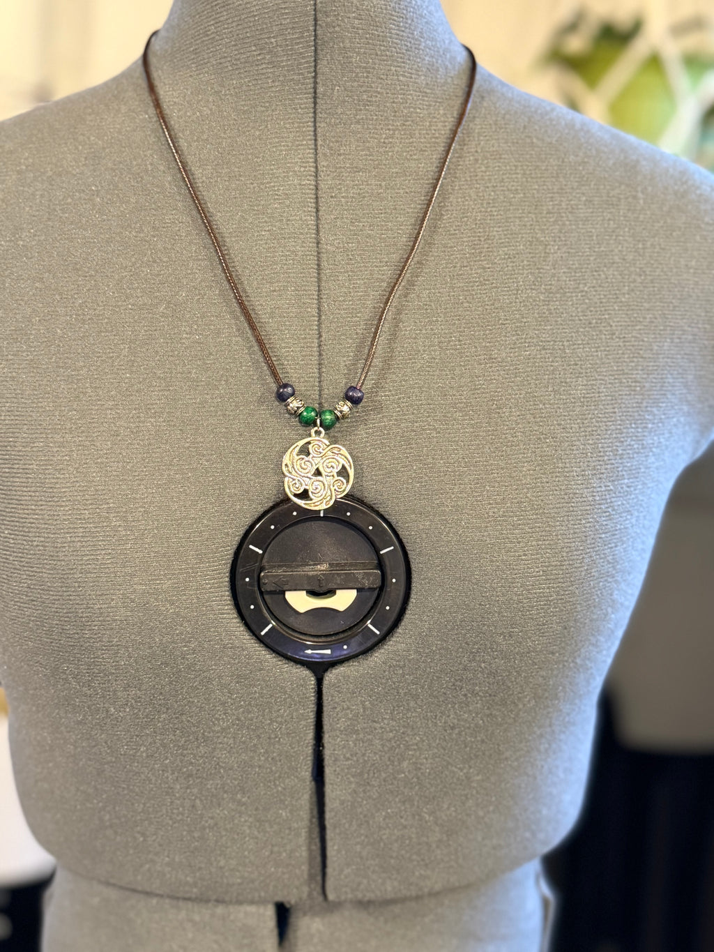 celtic knot necklace with blue and green beads