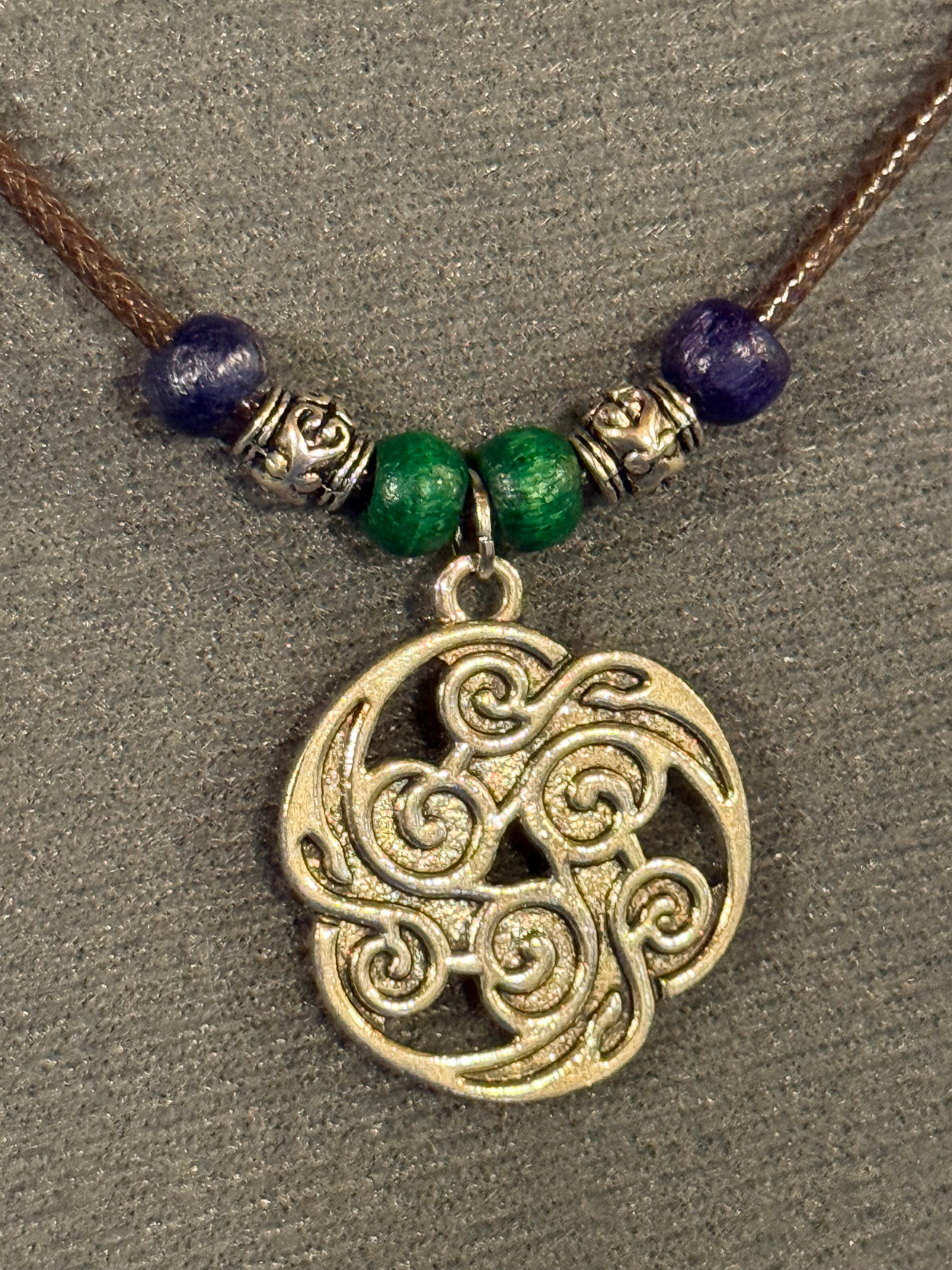 celtic knot necklace with blue and green beads