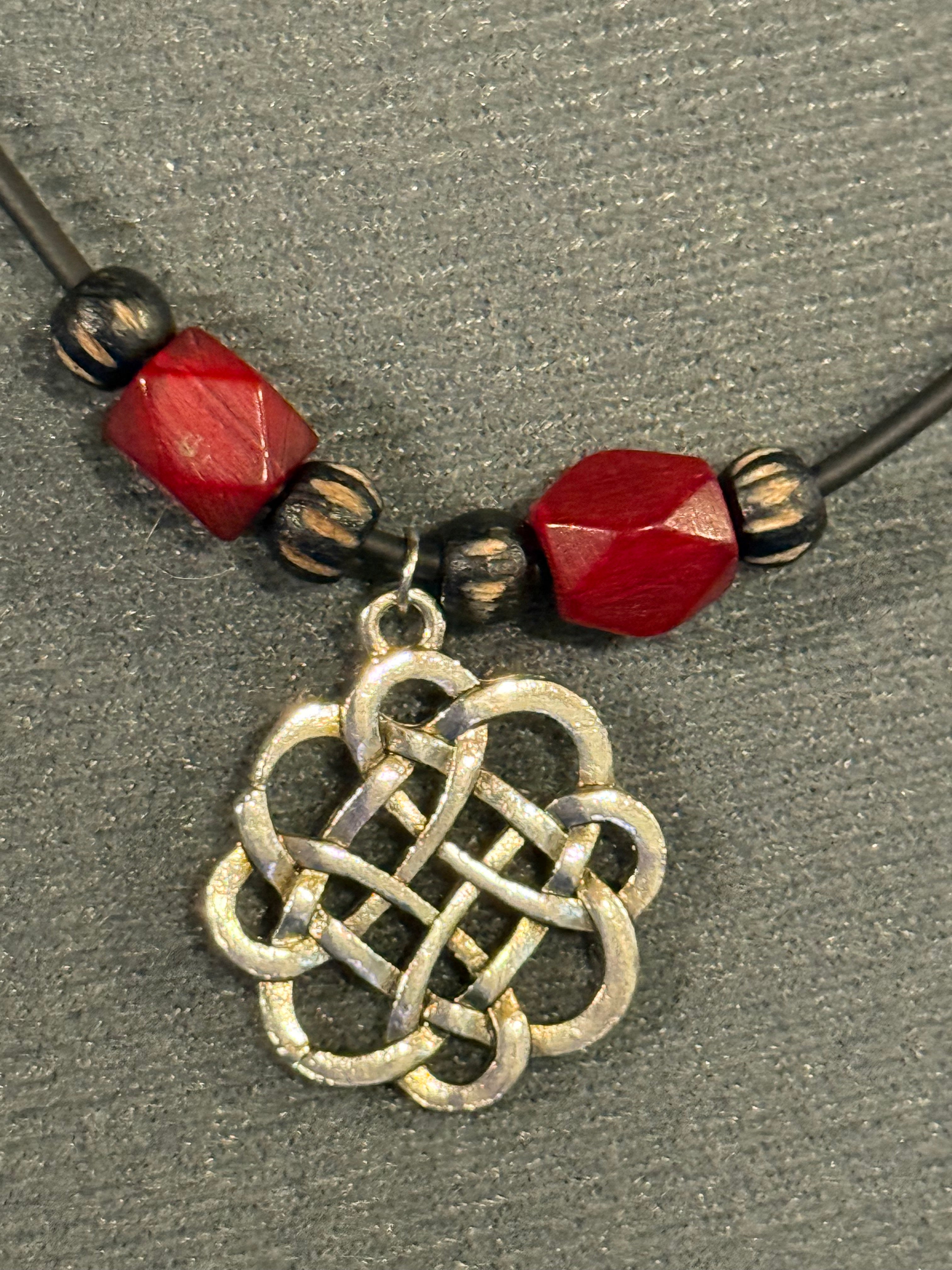 celtic knot necklace with red beads