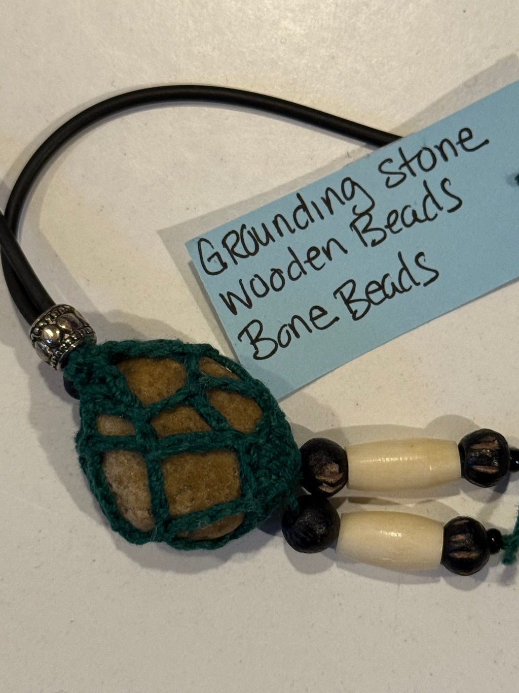 grounding stone necklace with bone beads
