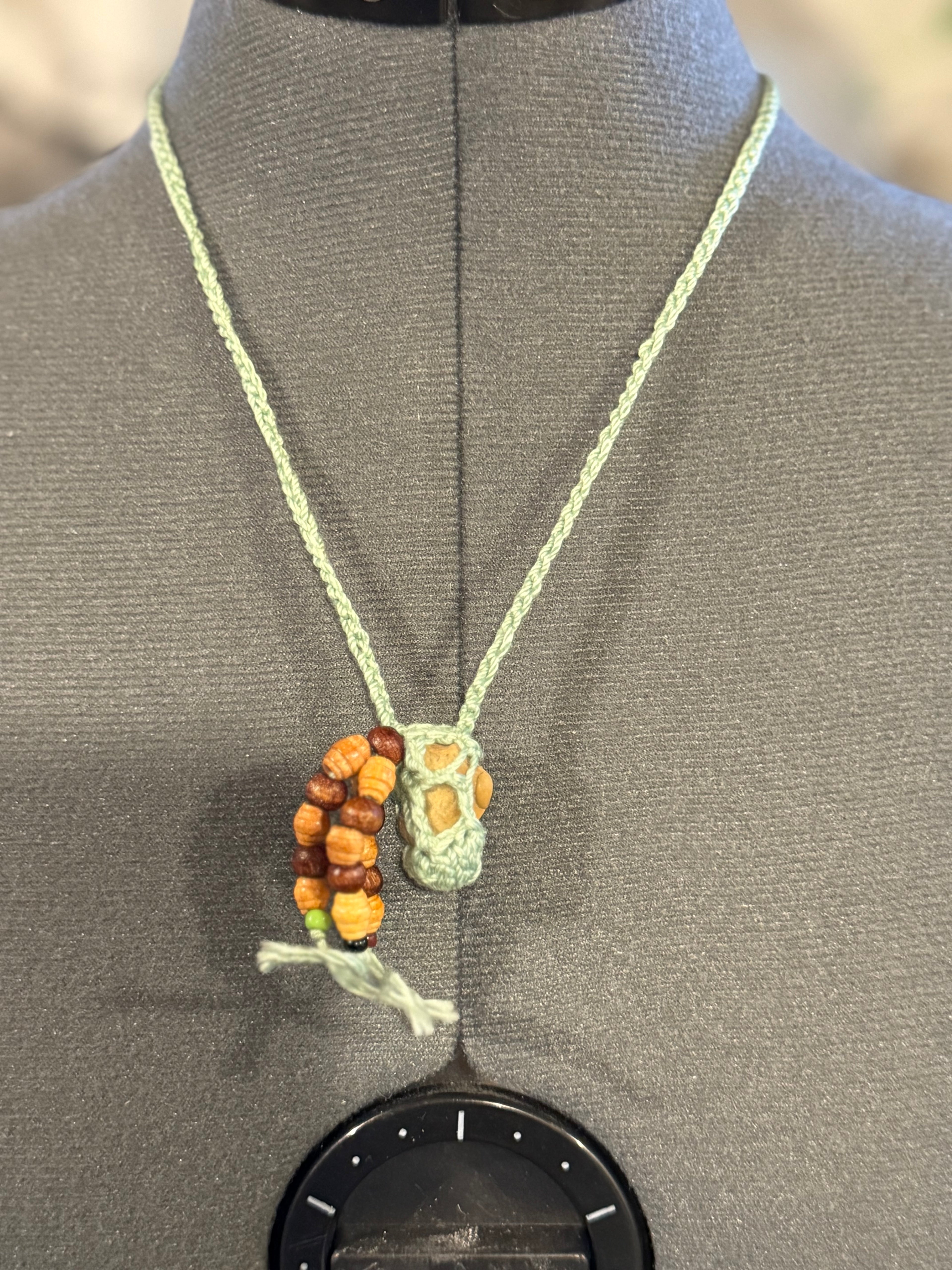 light green grounding stone necklace with wooden beads