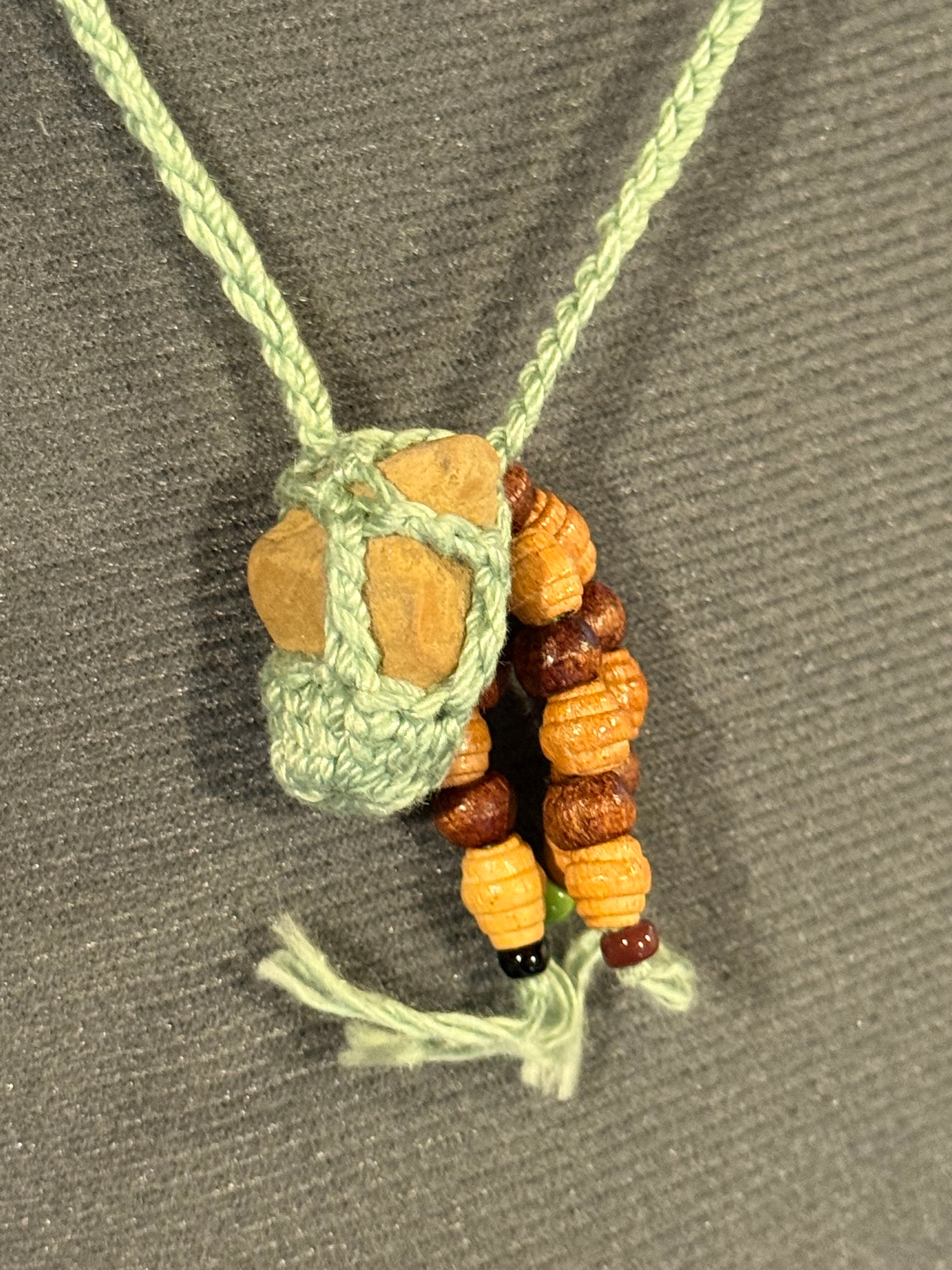 light green grounding stone necklace with wooden beads
