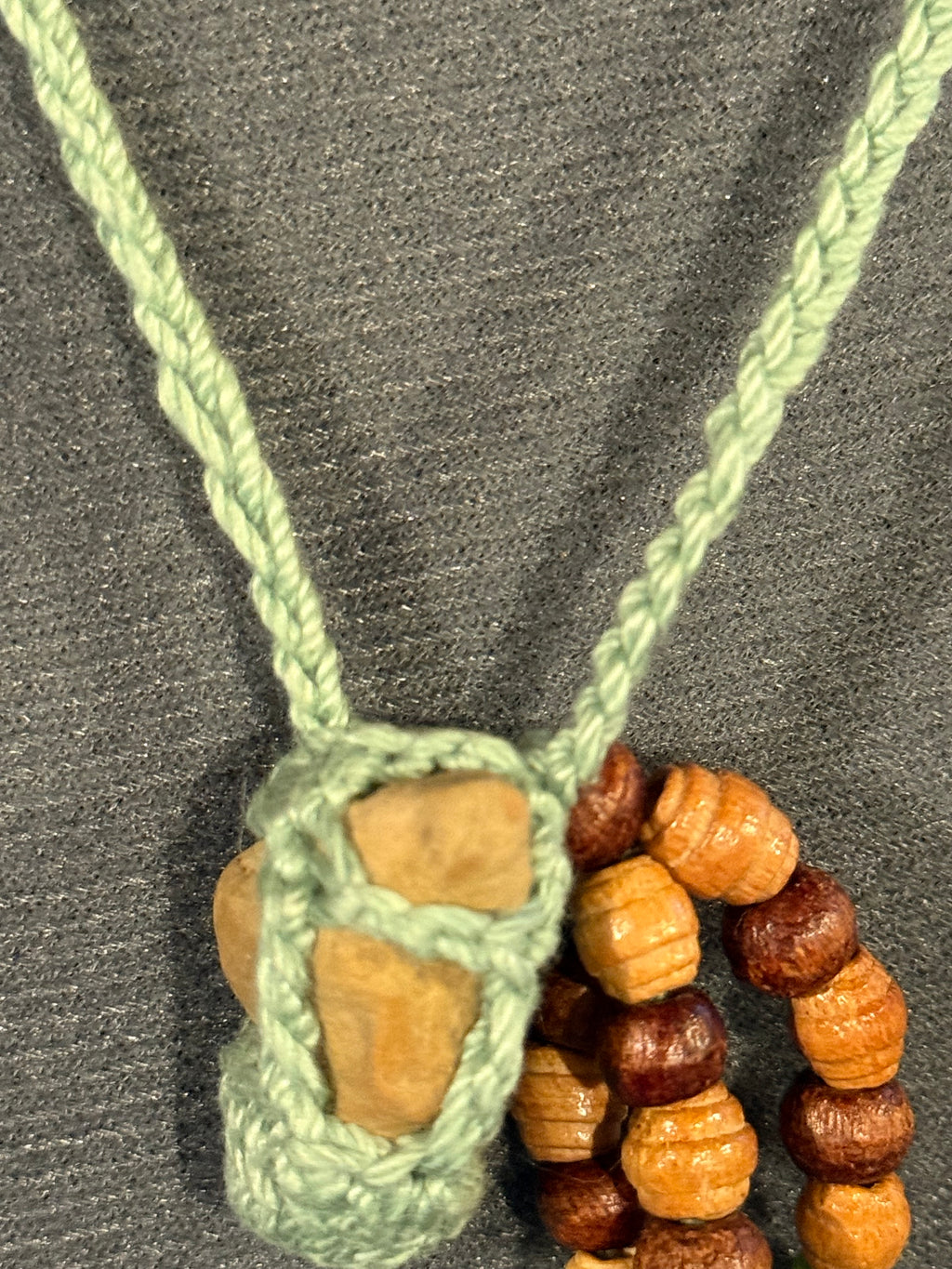 light green grounding stone necklace with wooden beads