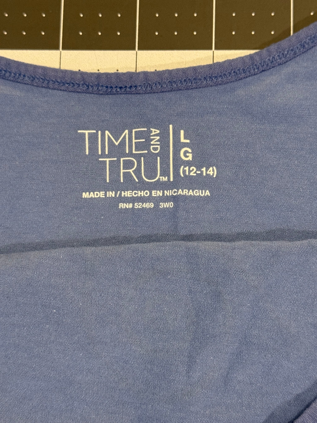 smokey blue tank with black world's tree