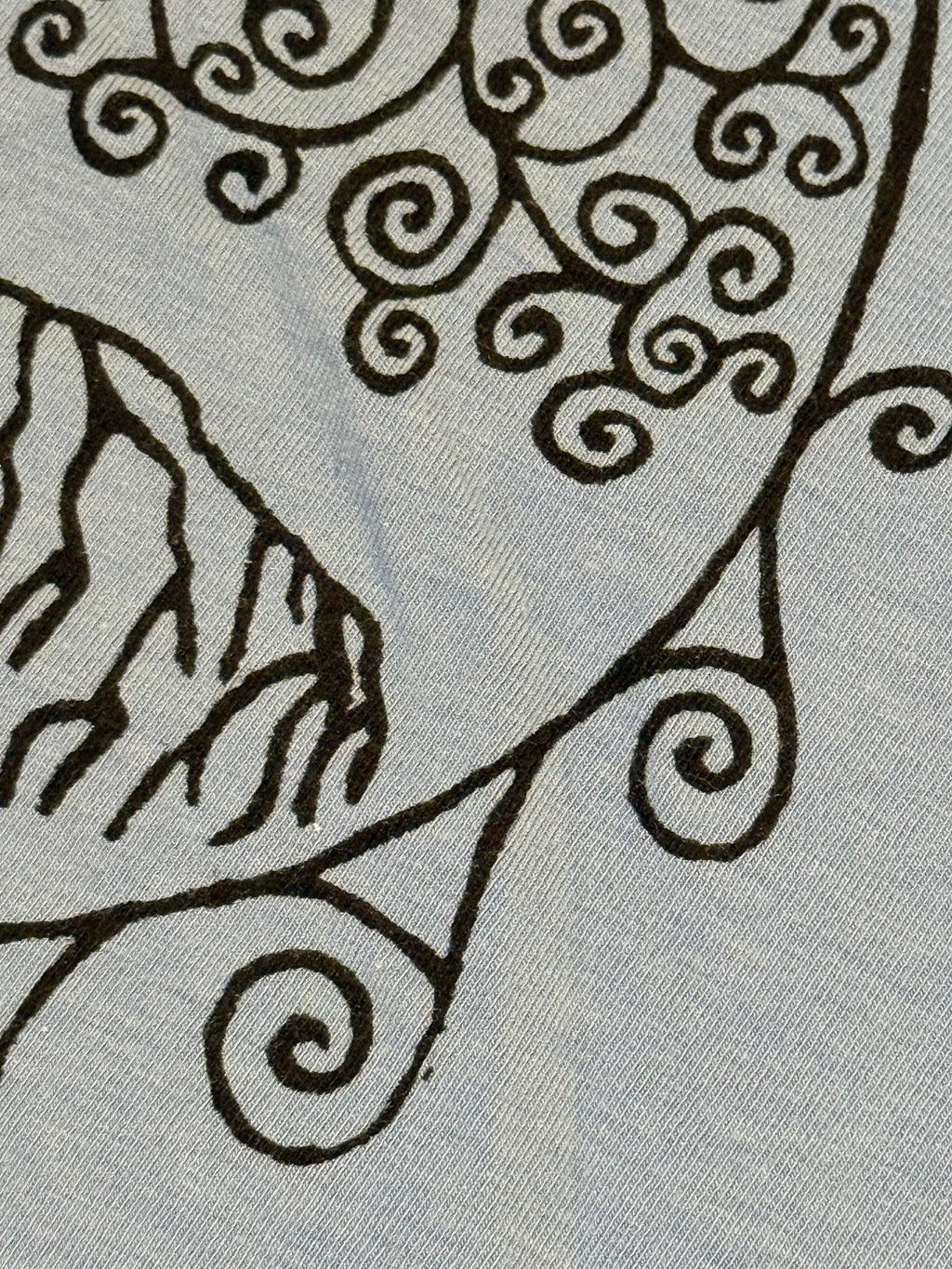 smokey blue tank with black world's tree