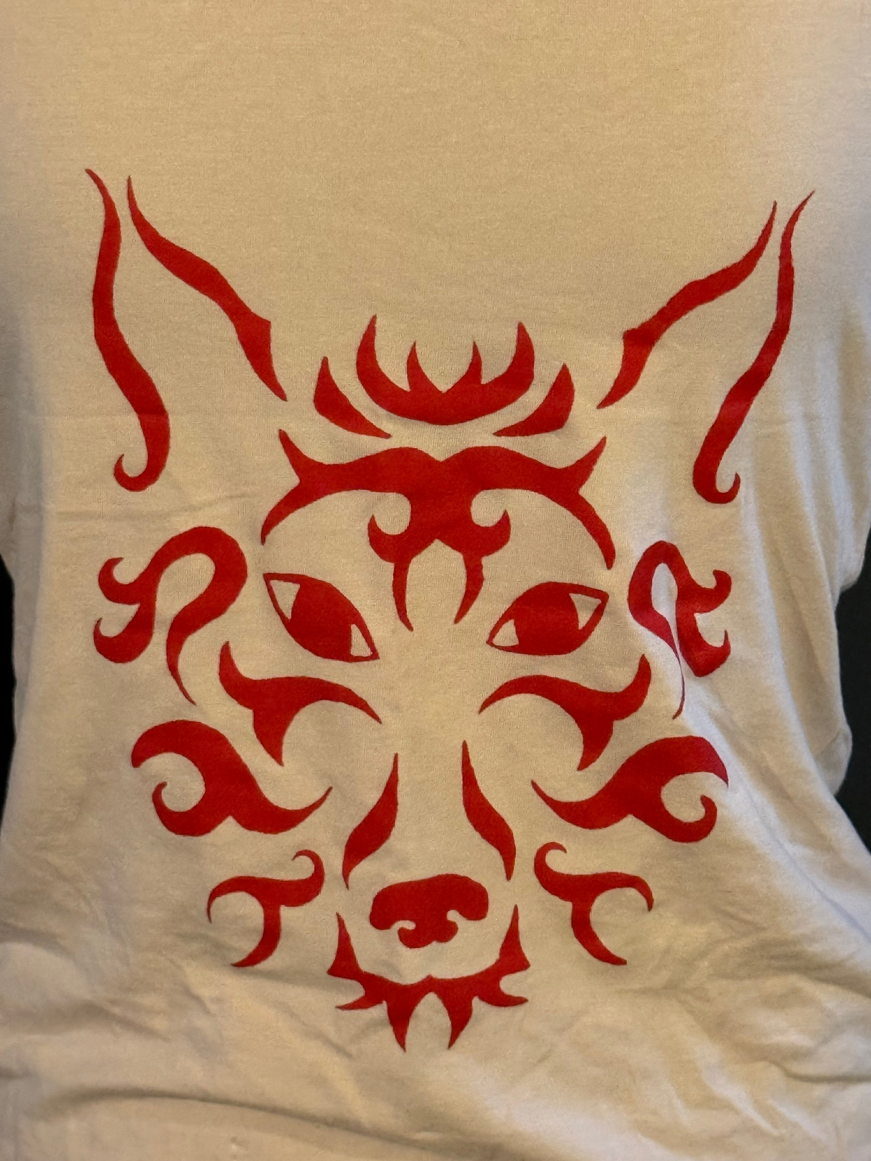 cream colored tank with red wolf
