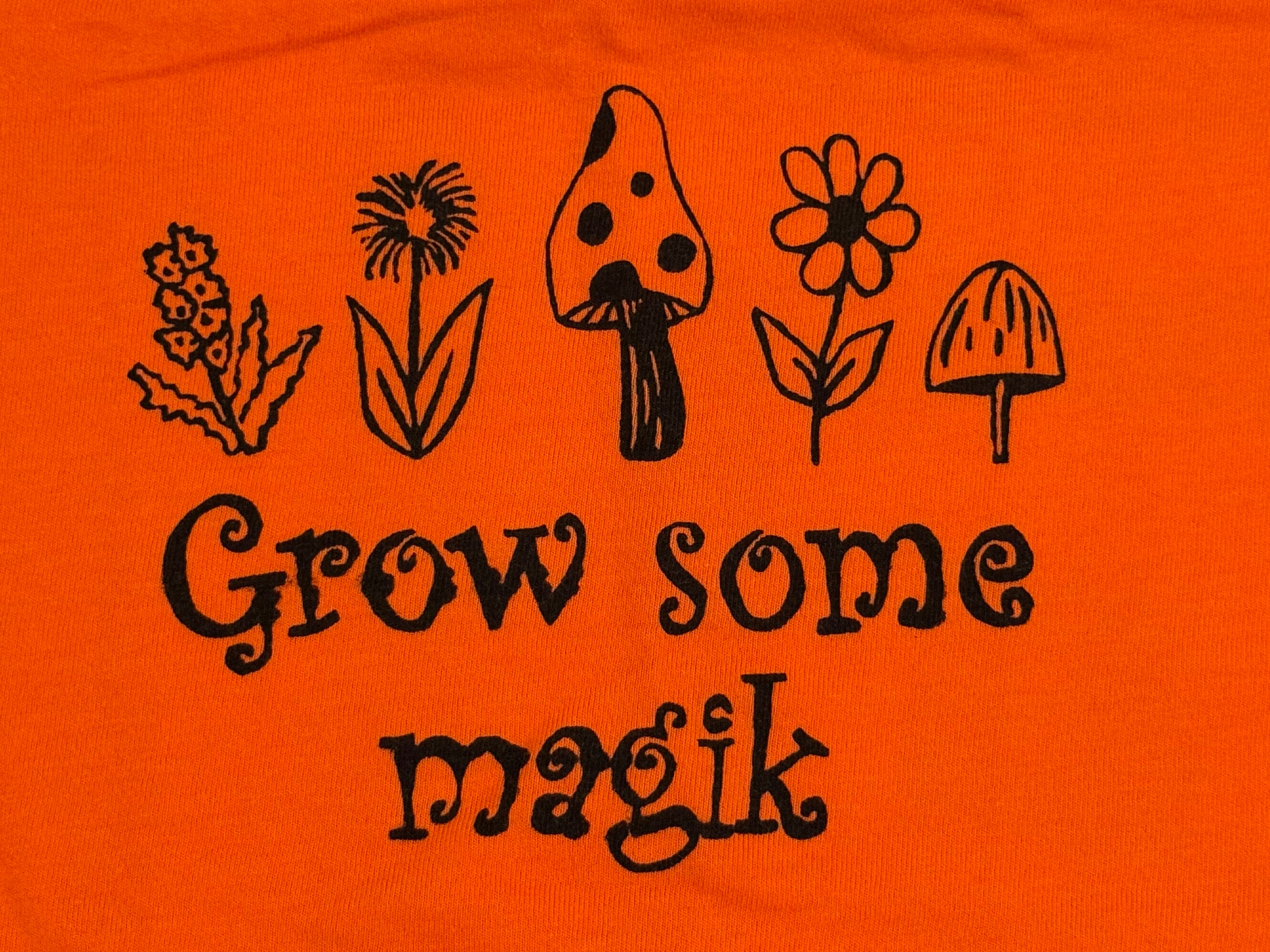 grow some magik orange T