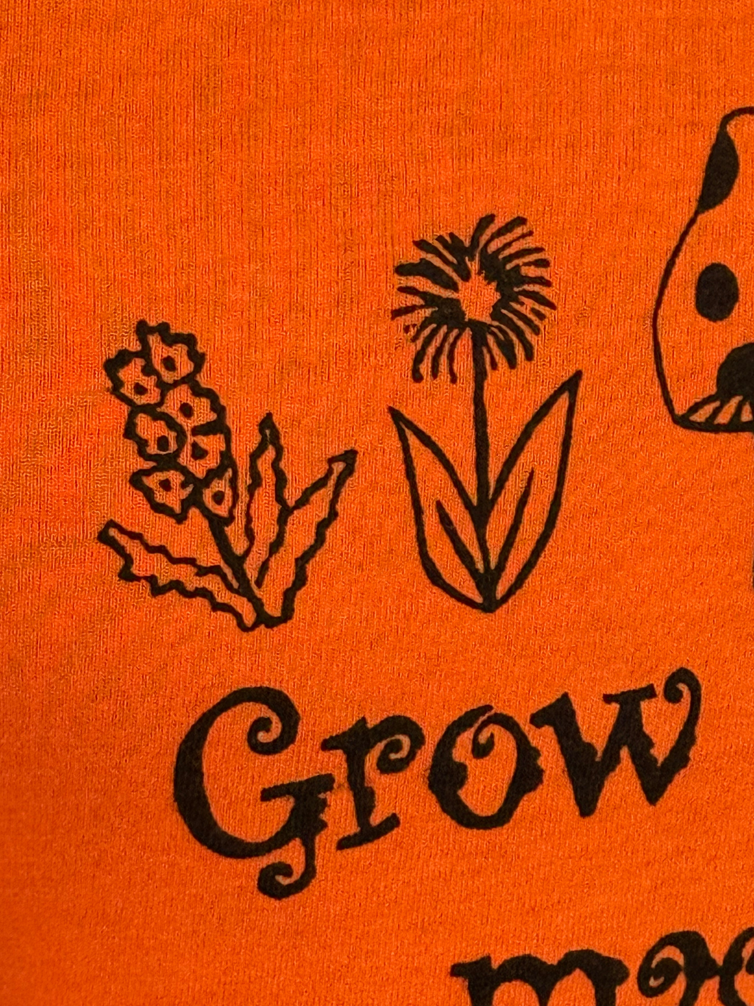 grow some magik orange T