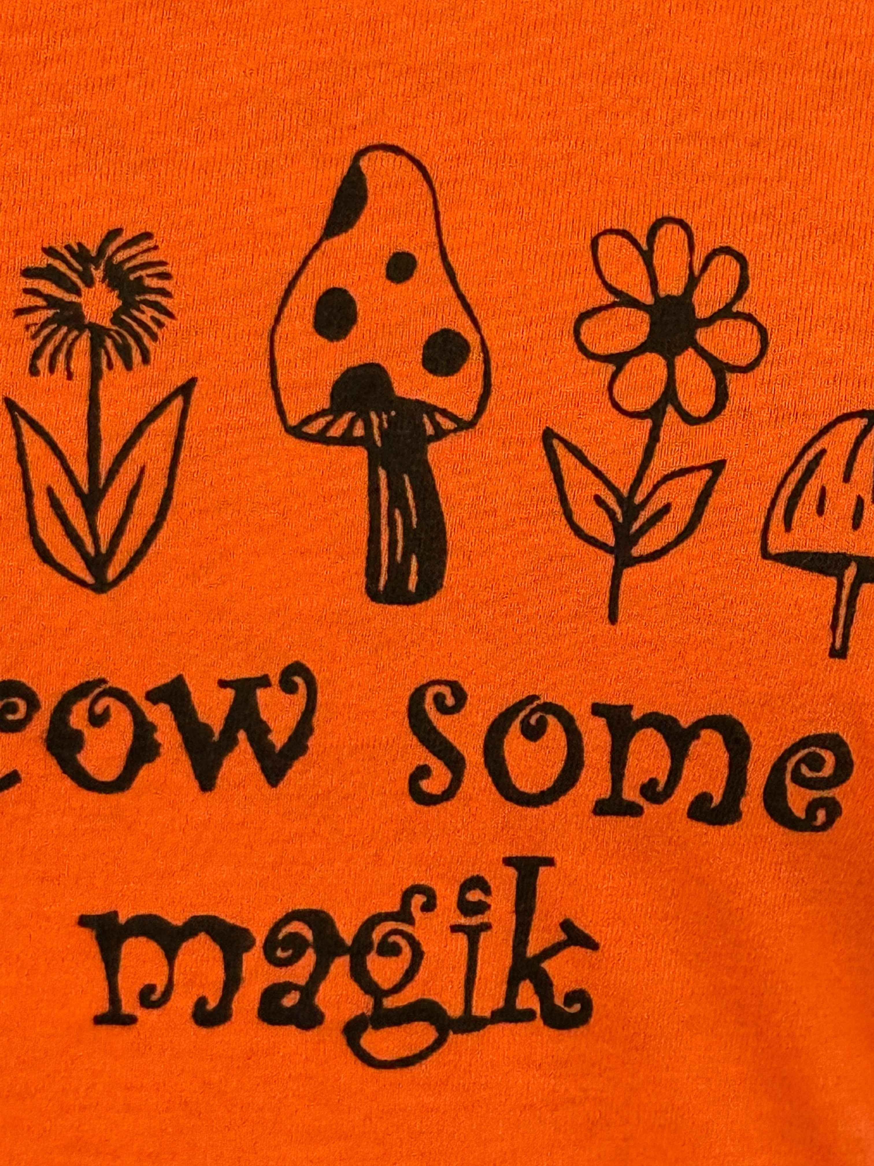grow some magik orange T