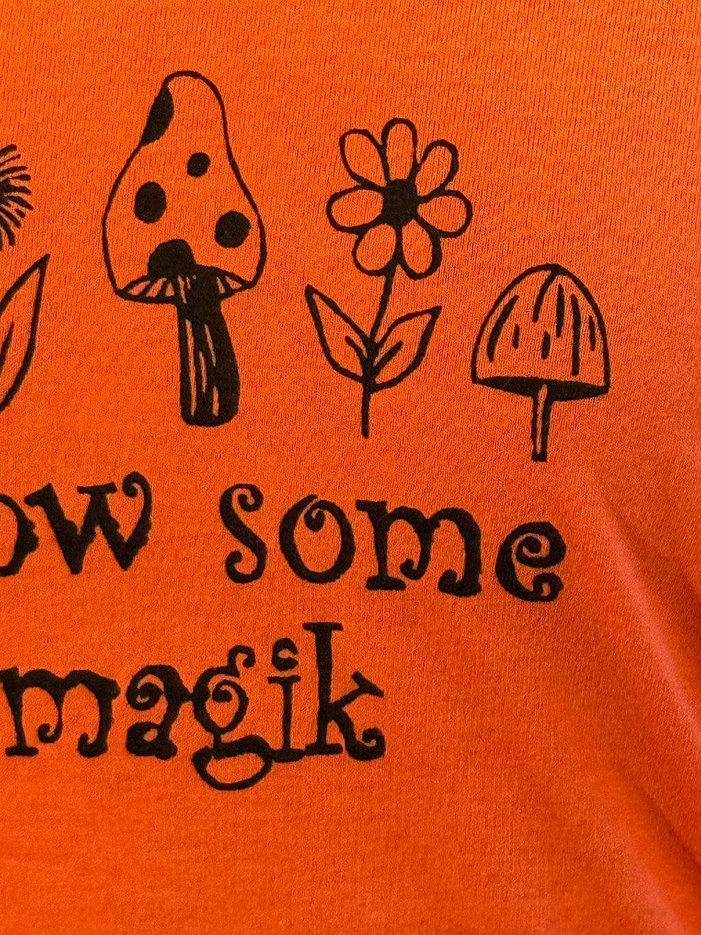 grow some magik orange T