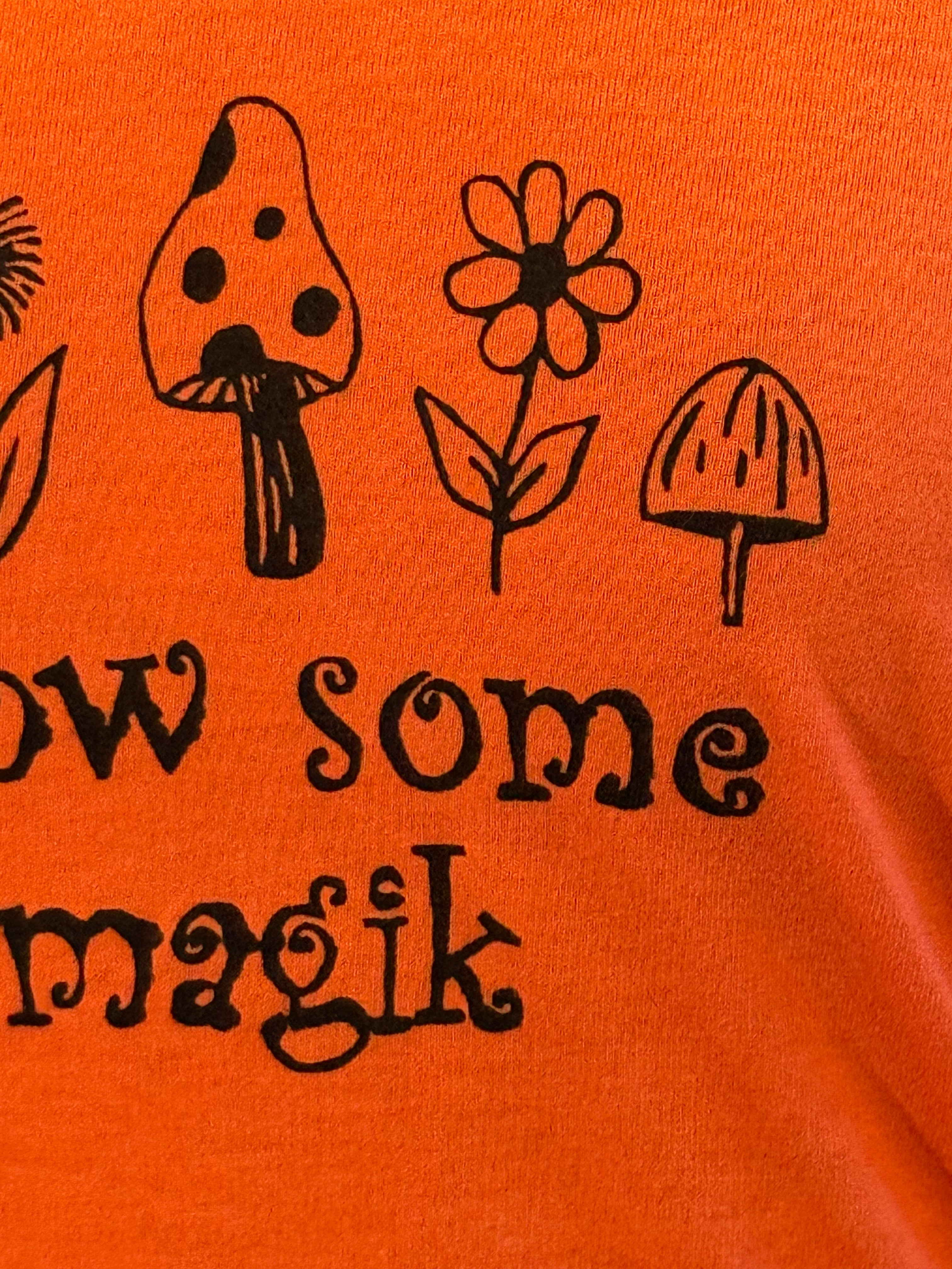 grow some magik orange T