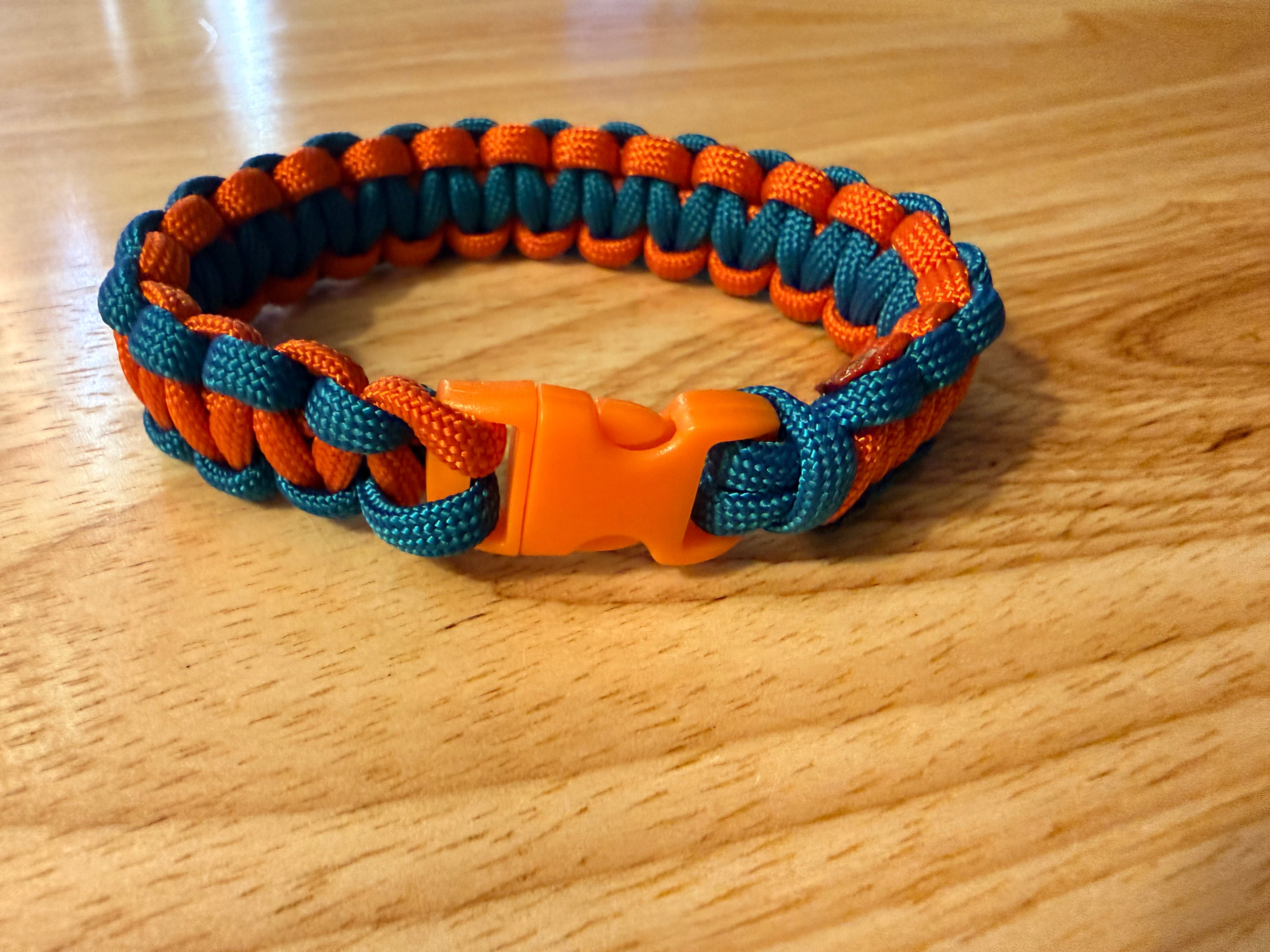 teal/orange paracord bracelet