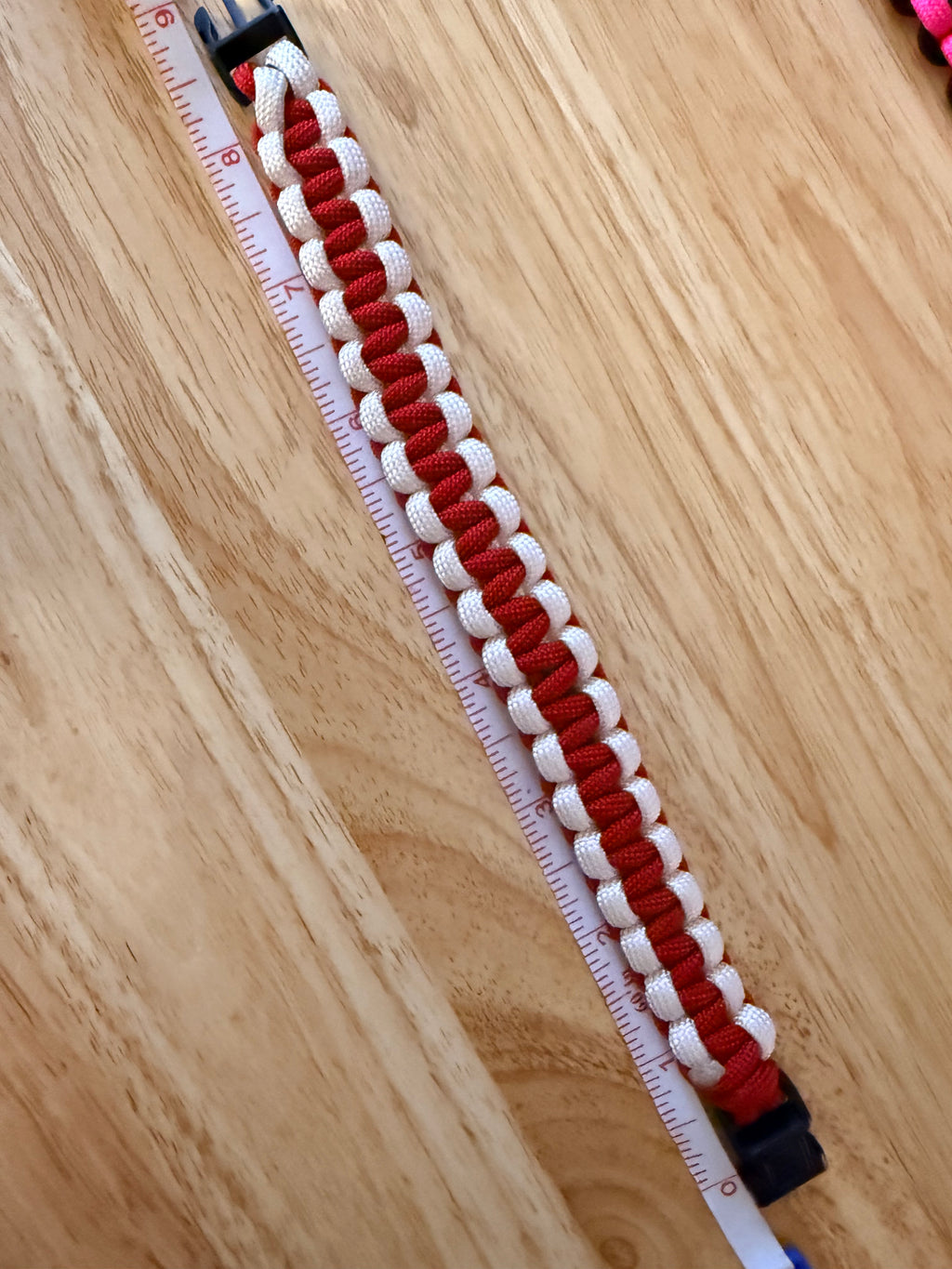 red and white paracord bracelet