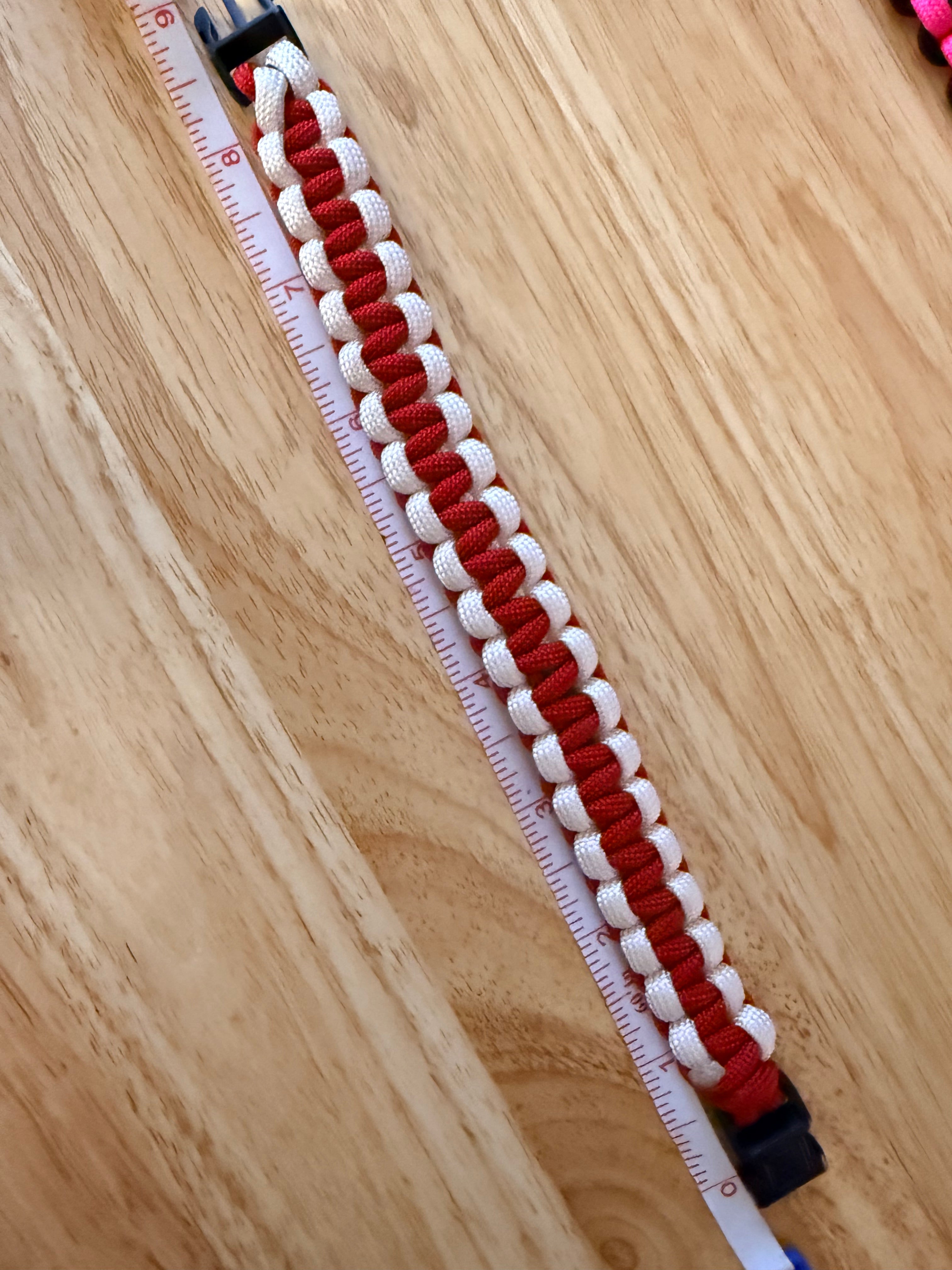red and white paracord bracelet