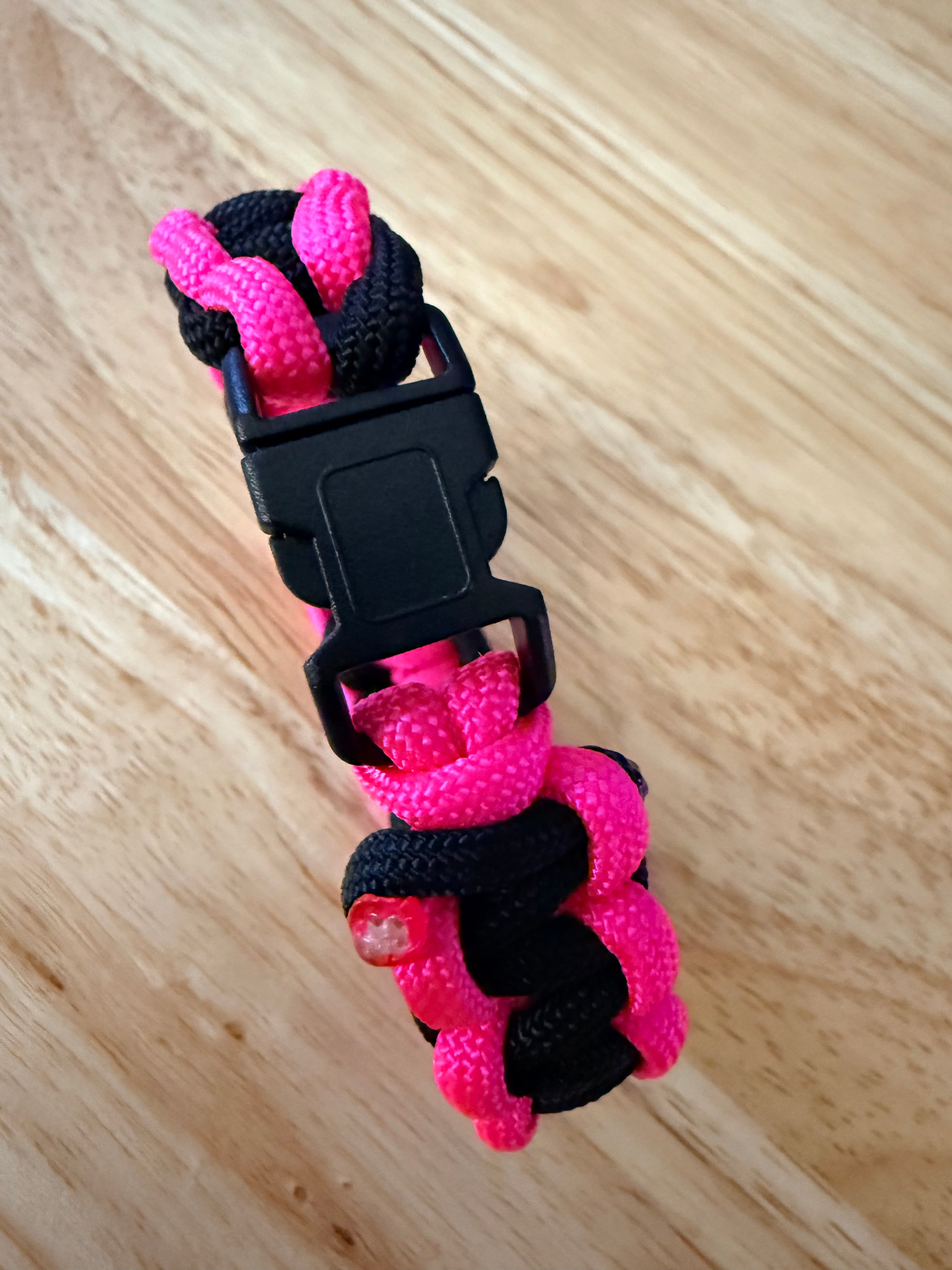 hot pink and black paracord bracelet