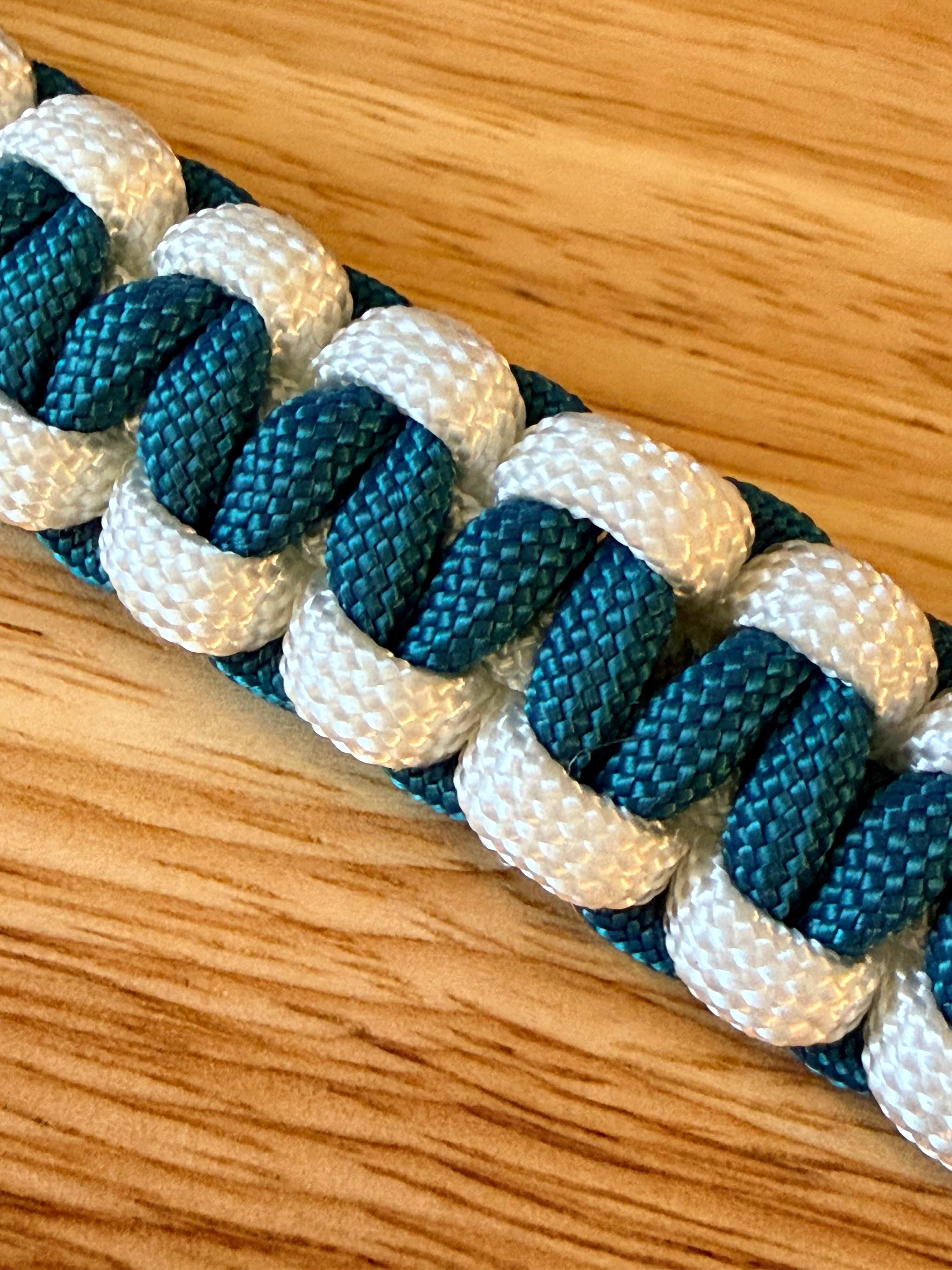 teal and white paracord bracelet
