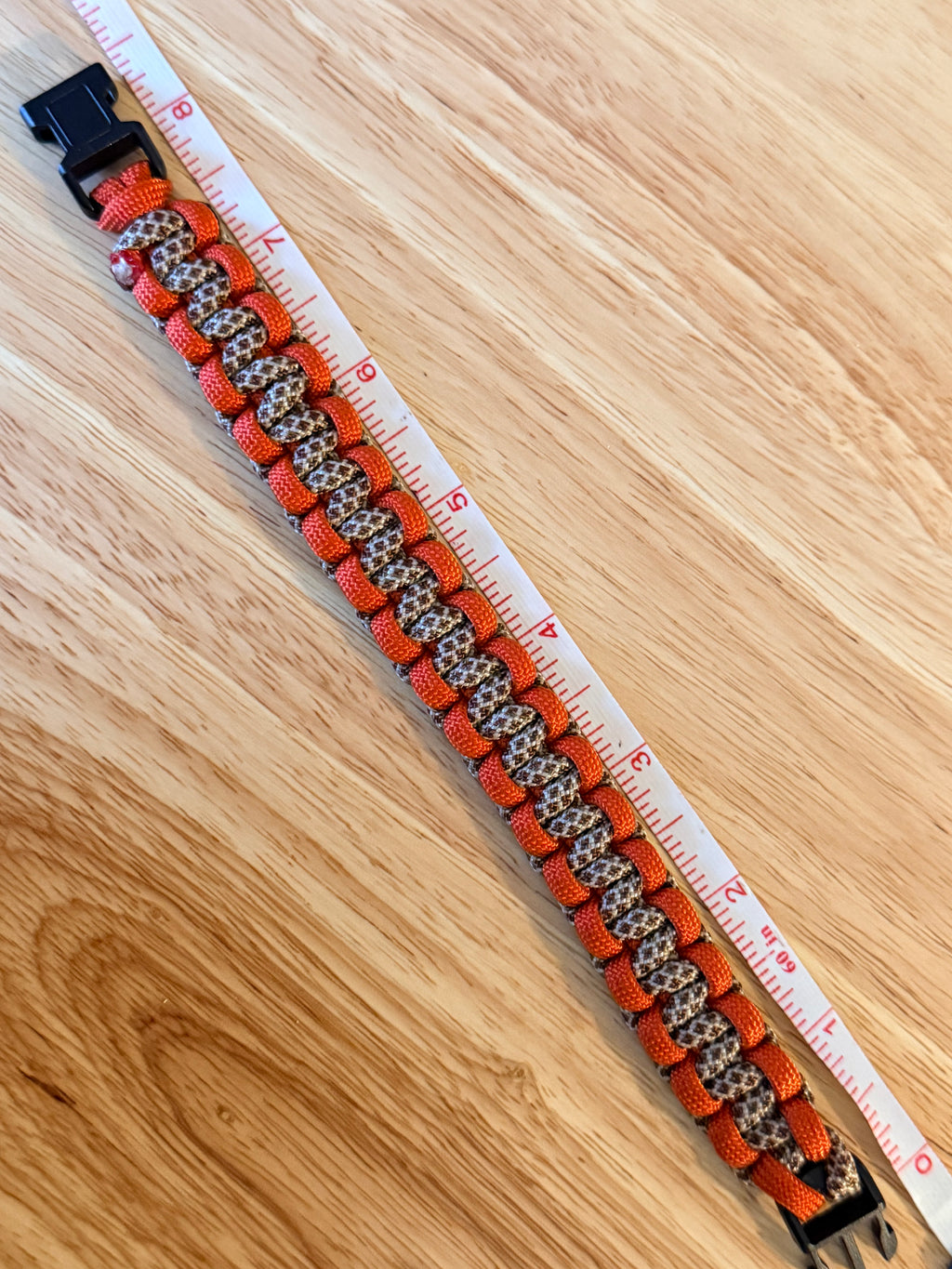 orange and brown paracord bracelet