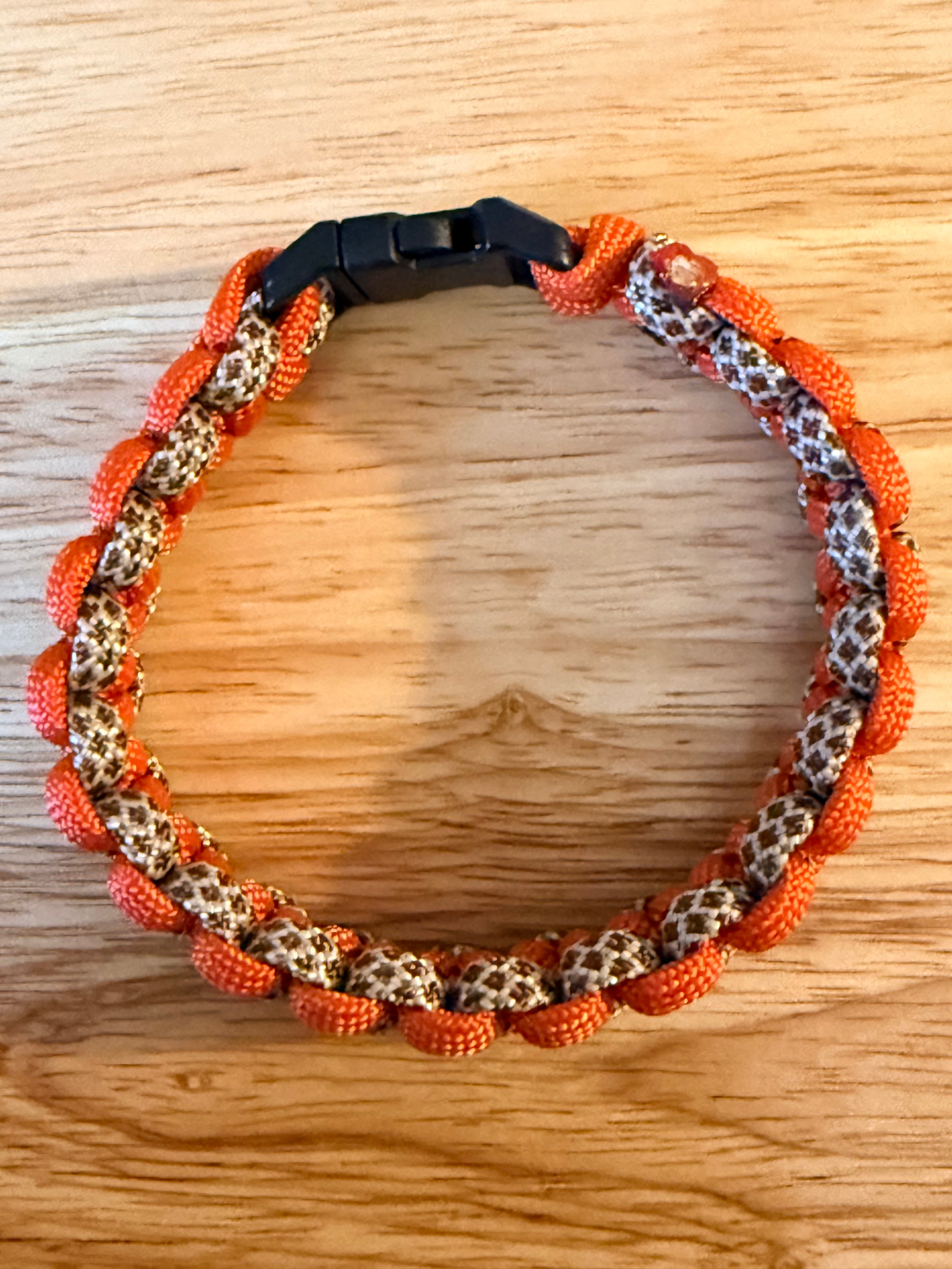 orange and brown paracord bracelet