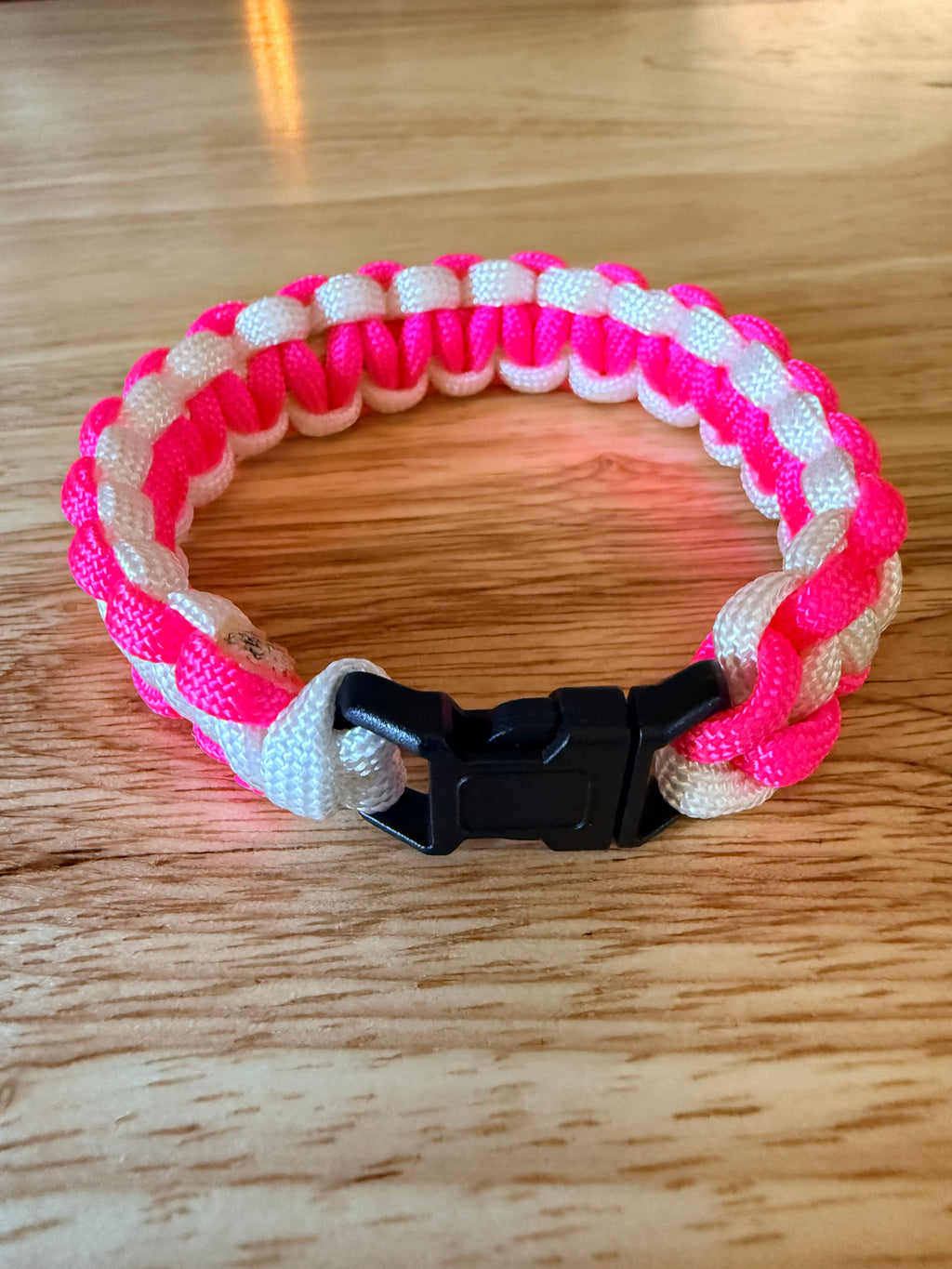 hot pink and white paracord bracelet