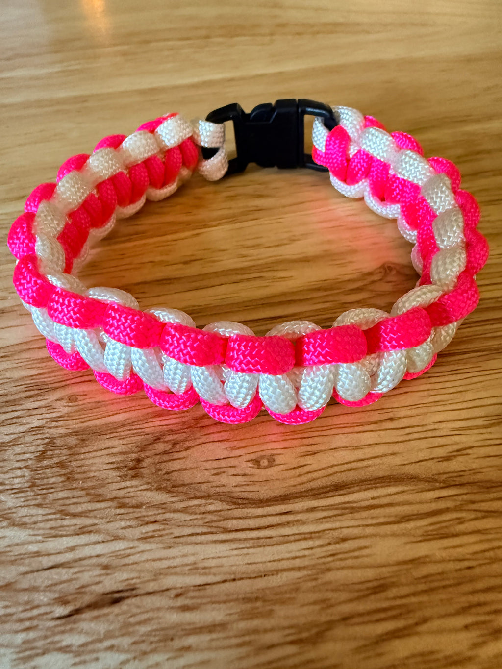 hot pink and white paracord bracelet