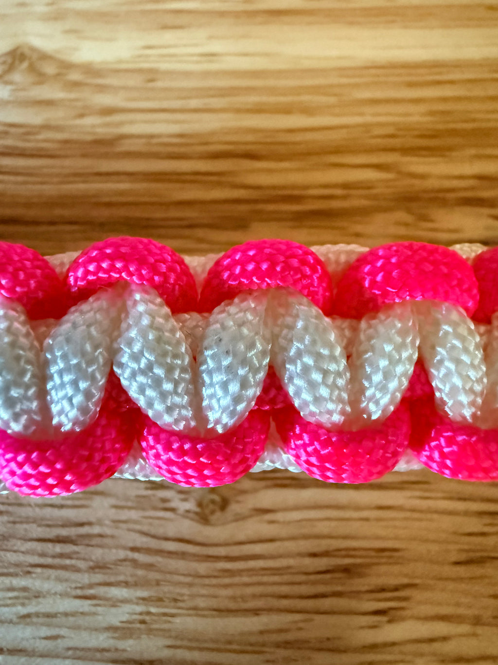 hot pink and white paracord bracelet