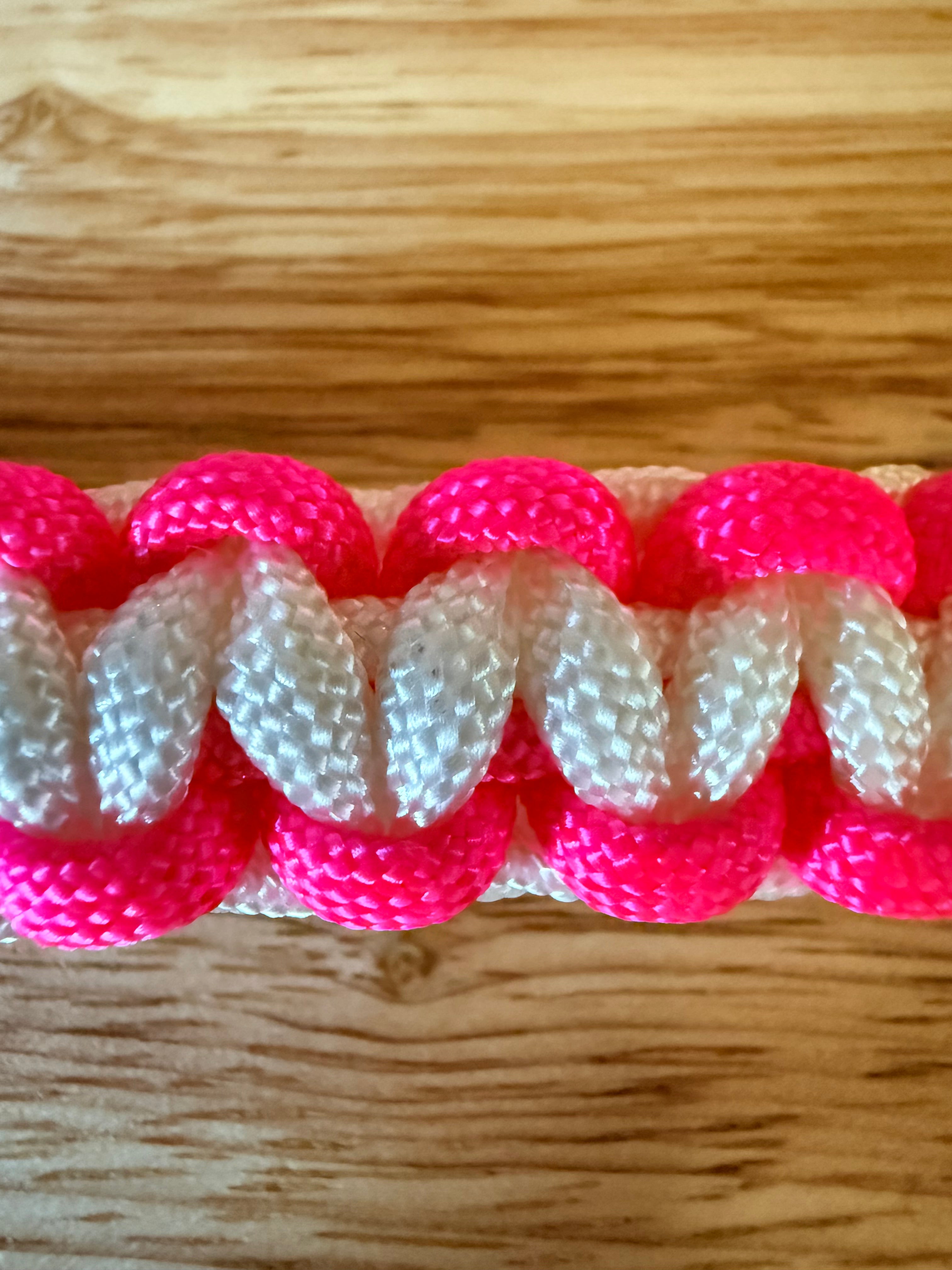 hot pink and white paracord bracelet