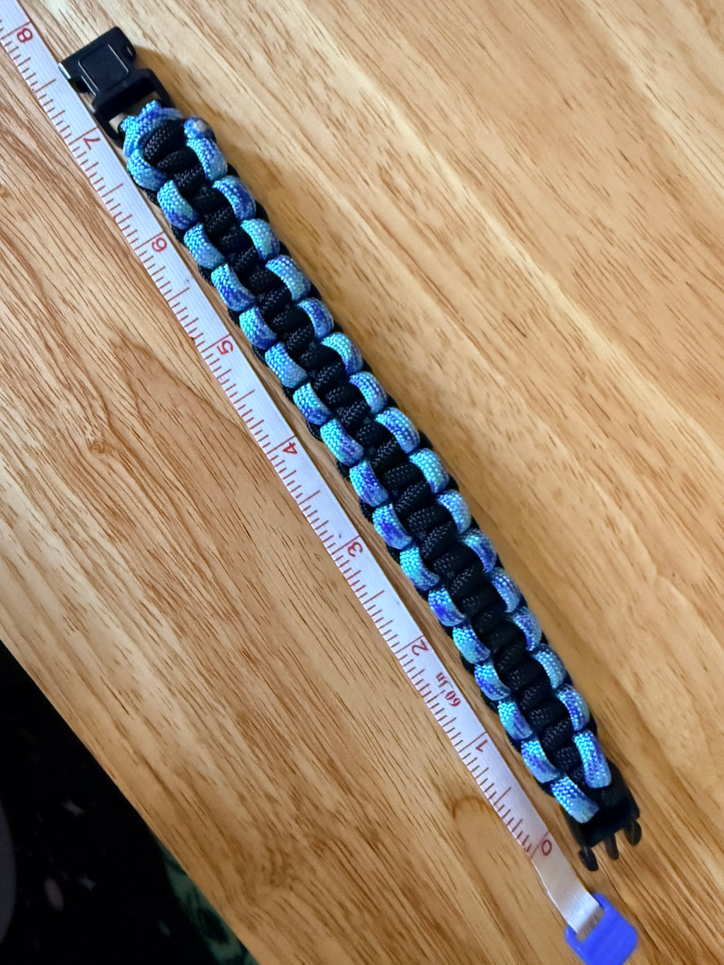 black and light blue/purple paracord bracelet