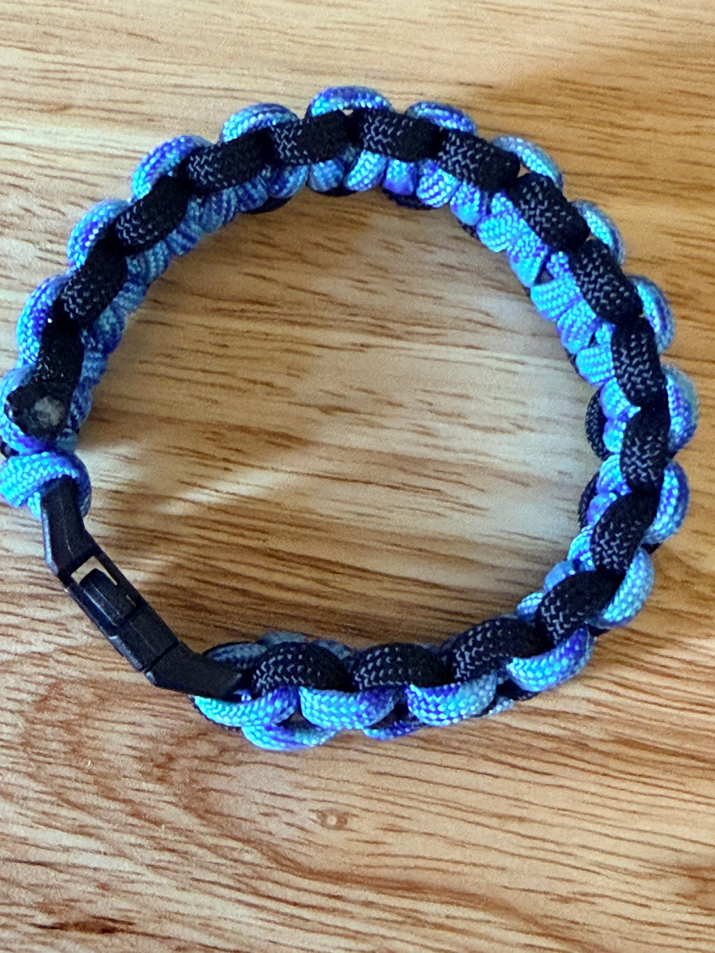 black and light blue/purple paracord bracelet