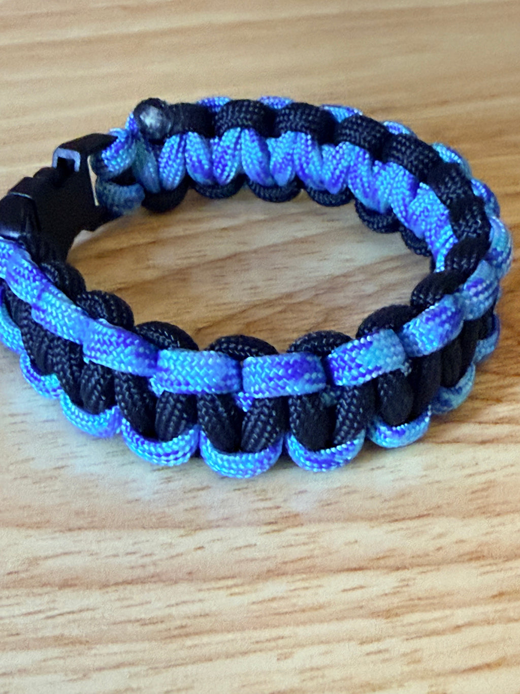 black and light blue/purple paracord bracelet