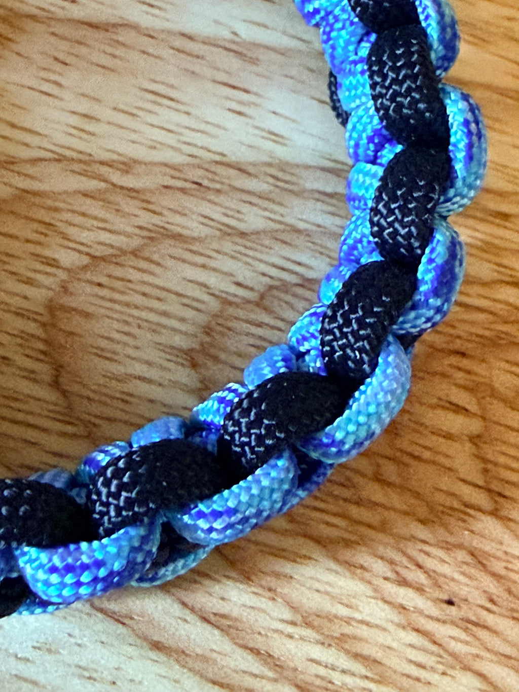 black and light blue/purple paracord bracelet