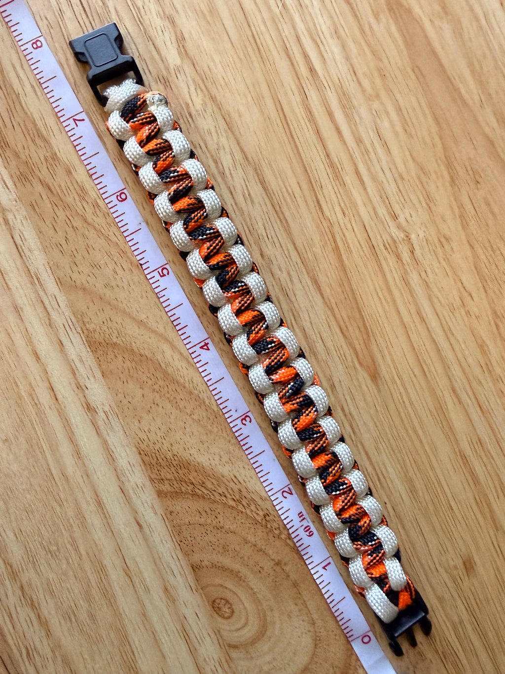 orange/black & white paracord bracelet