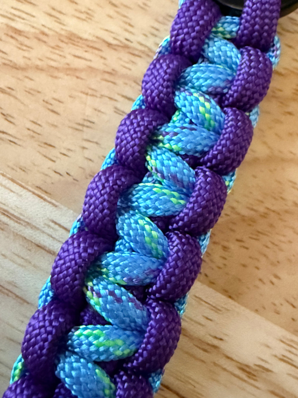 6 inch purple and light blue speckled with yellow and purple paracord key chain