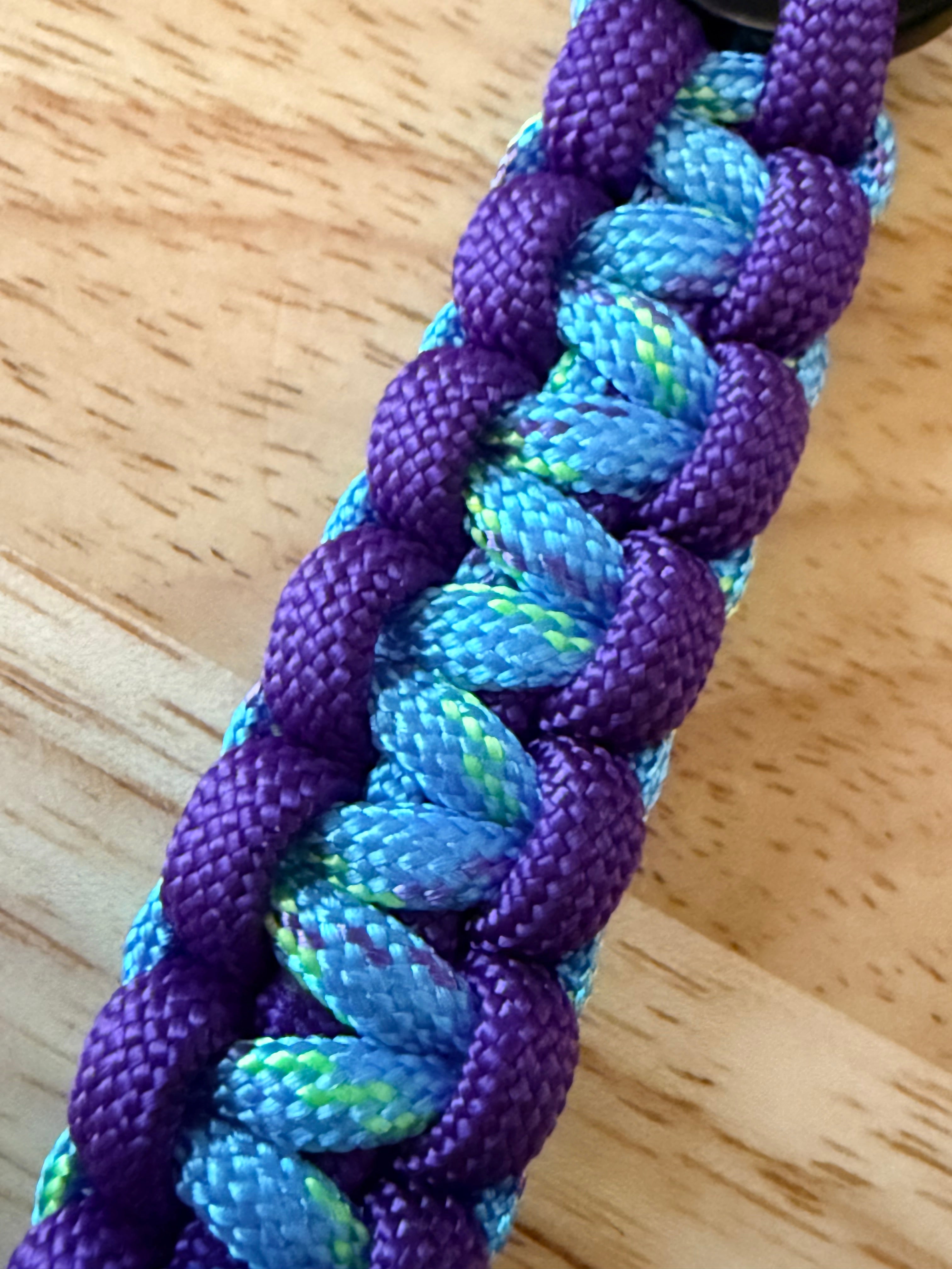 6 inch purple and light blue speckled with yellow and purple paracord key chain