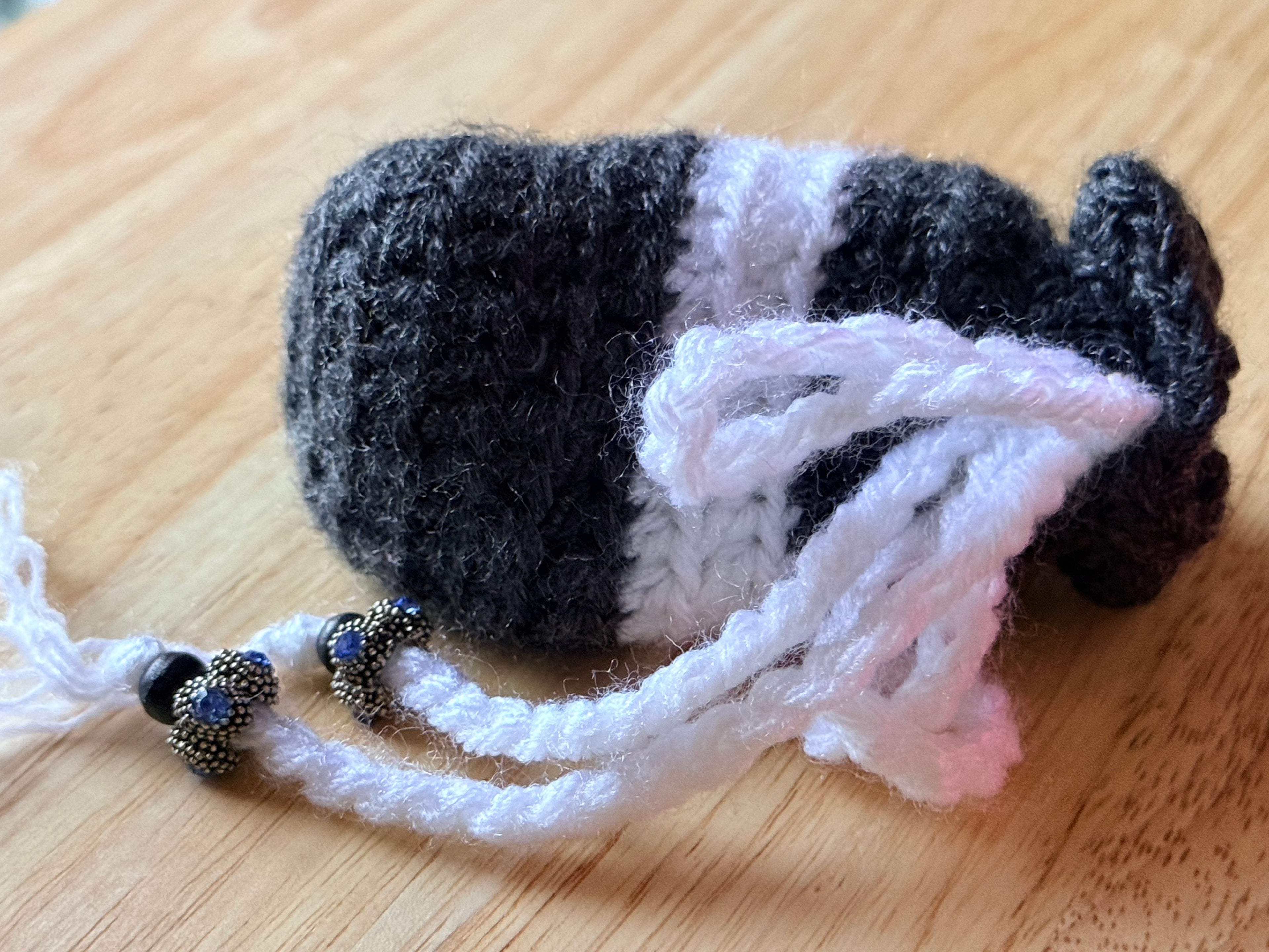 charcoal black and white dice bag