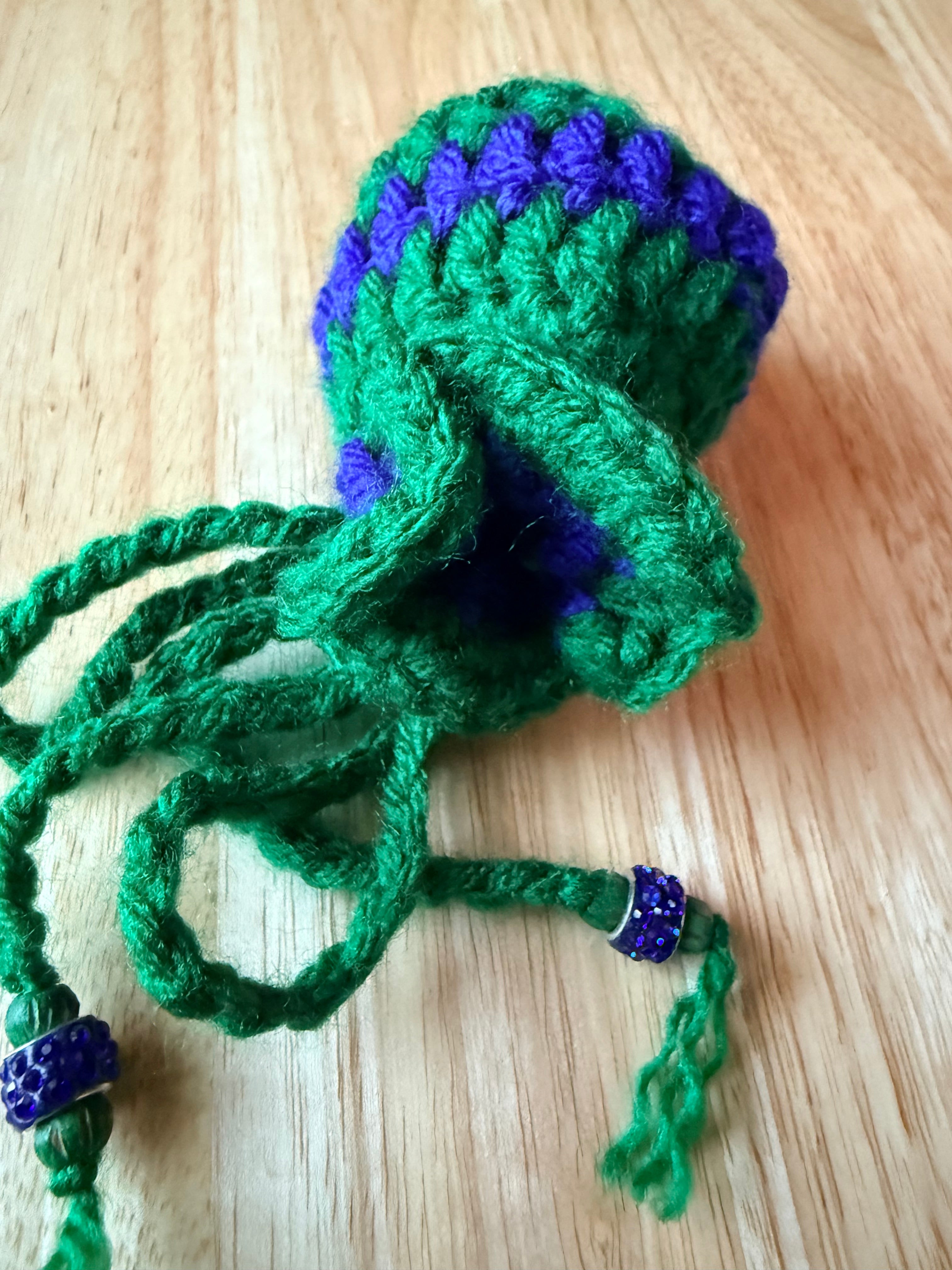green and blue dice bag