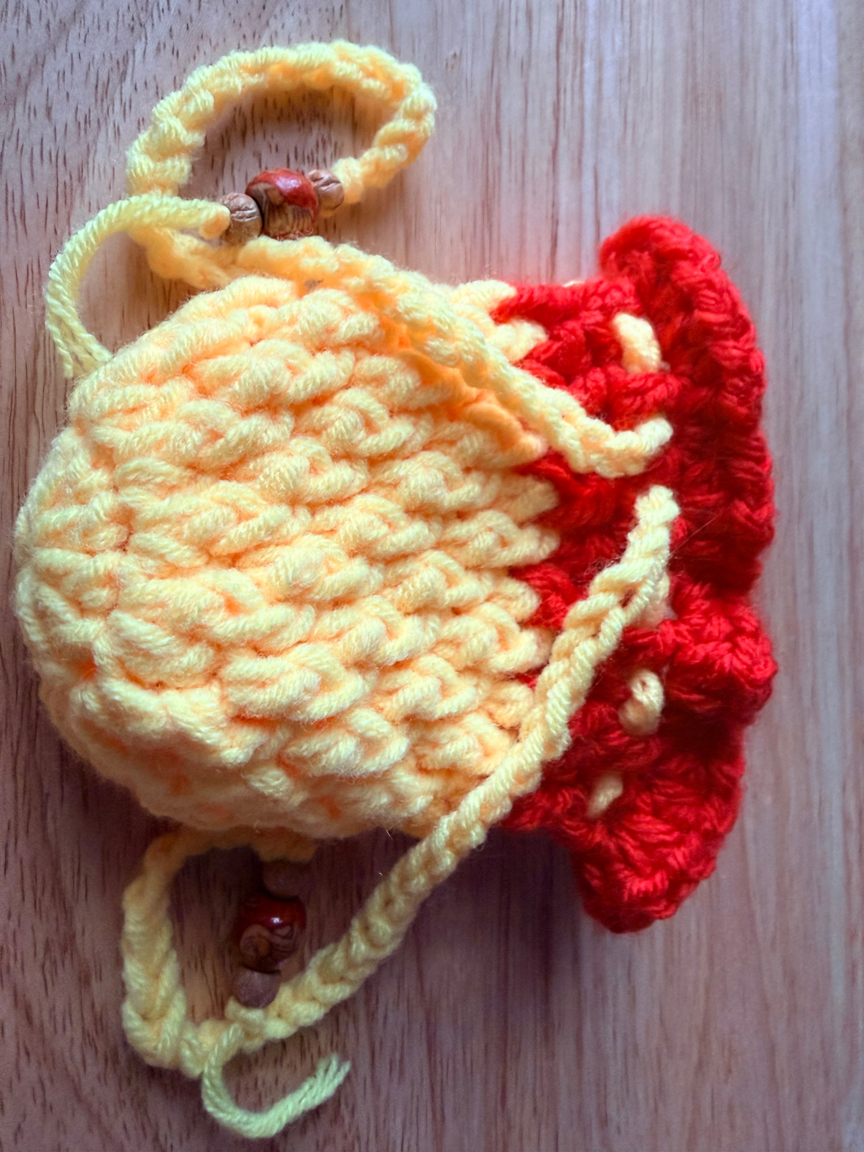 yellow and orange dice bag