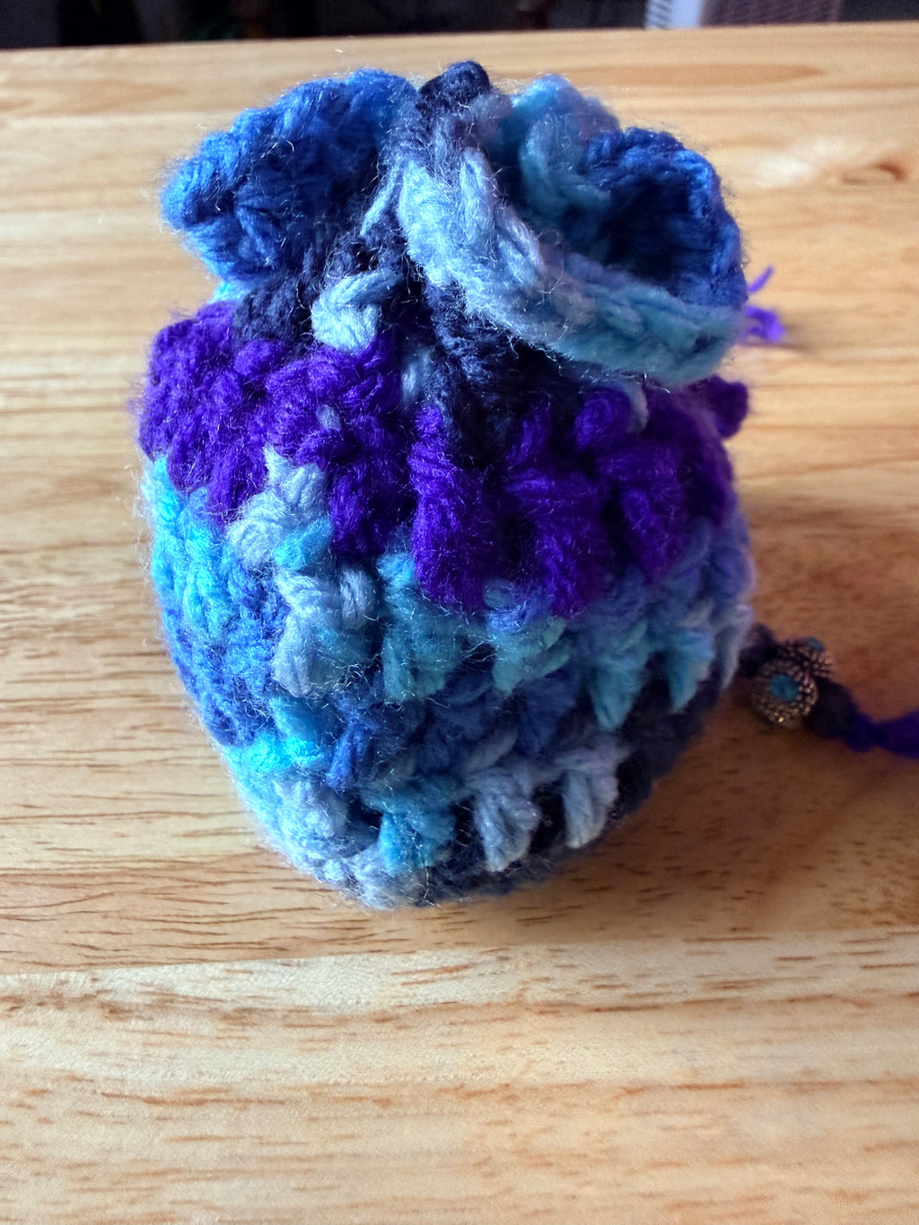 blues and purple dice bag
