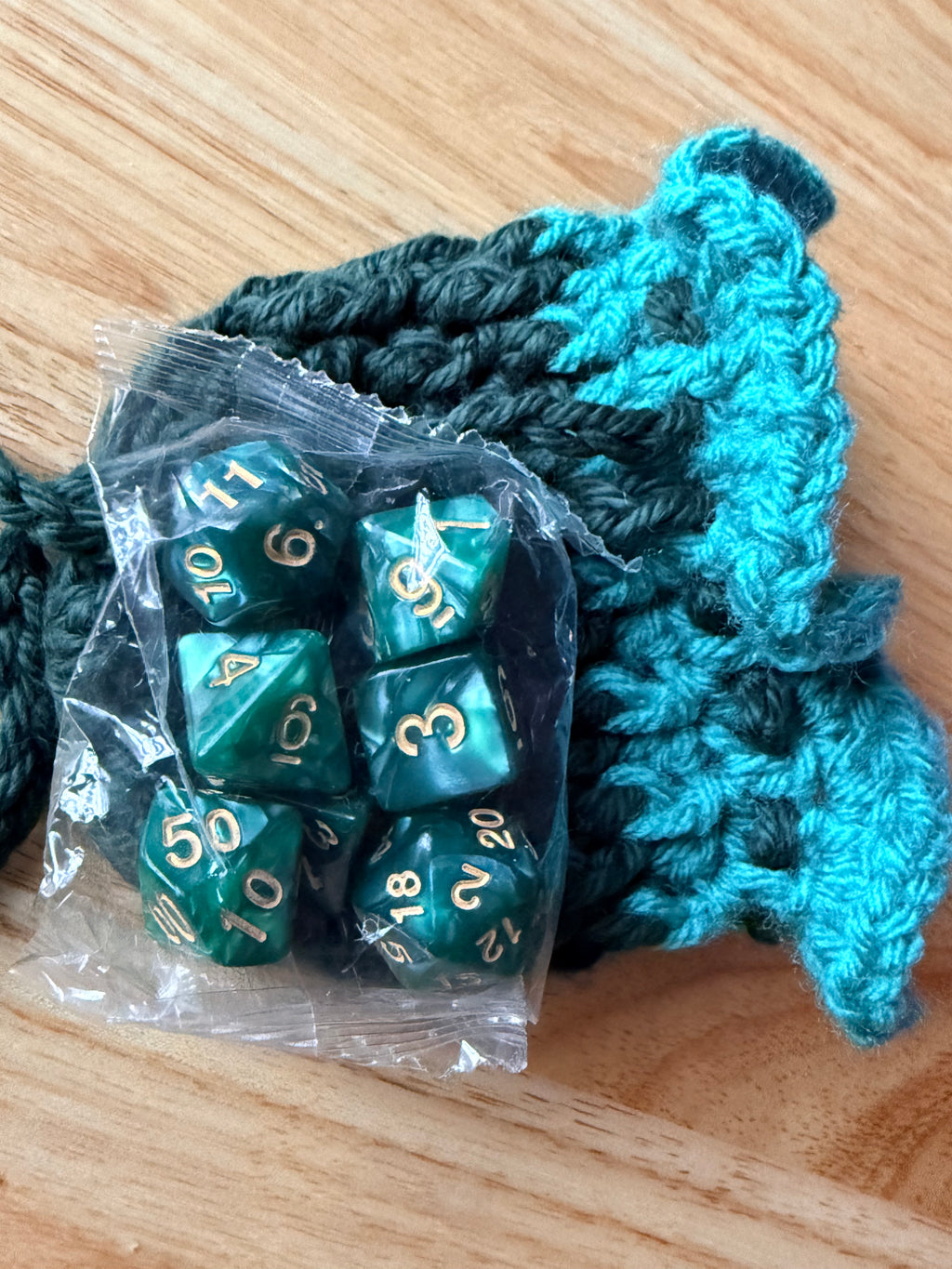 forest green and teal dice bag